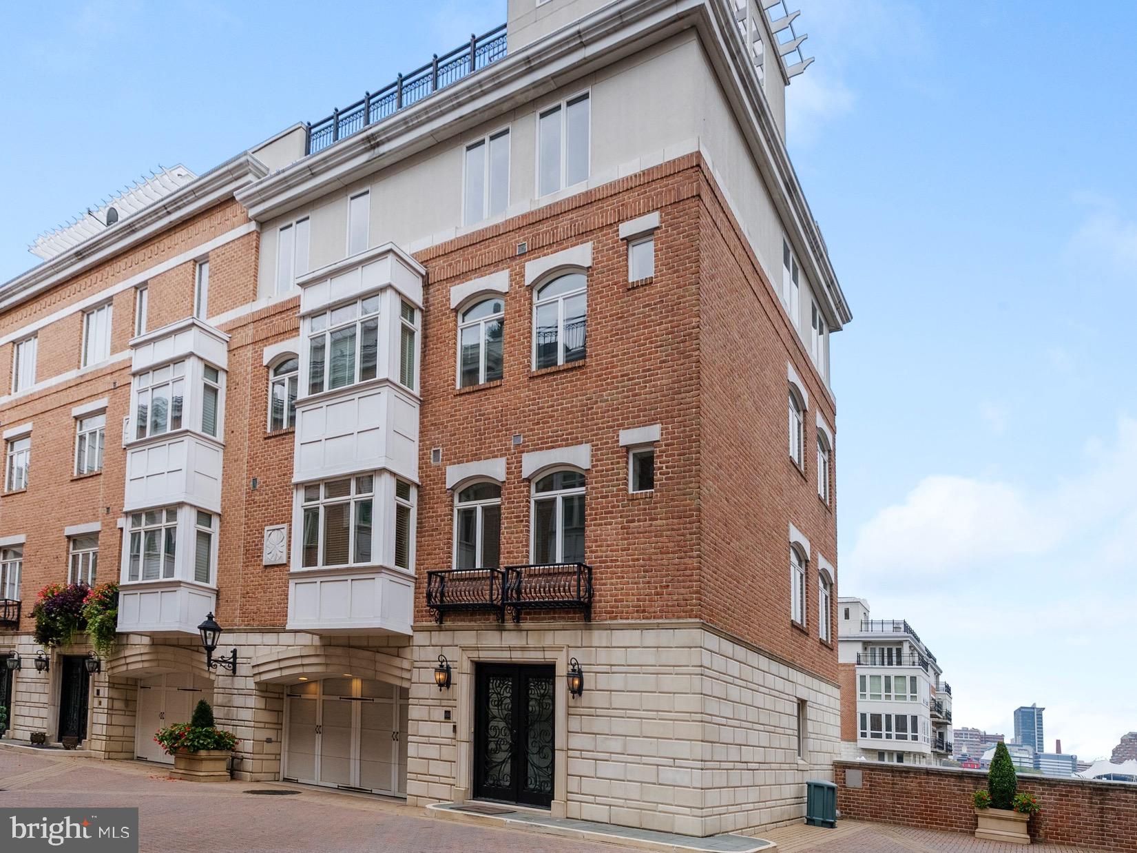 A truly exceptional opportunity to own one of Baltimore’s most unique and coveted residences at the Pier Homes at Harborview. Ponte Villas S offers exceptional proximity to Washington DC and Baltimore’s central business district. Minutes from I95, the nations capital and key DC locations are within 35-40 miles by car and easily accessible via the MARC Camden line in 30-45 minutes. The new corporate campuses of T. Rowe Price and Under Armour are minutes away via water taxi, a short walk or drive. Residents enjoy the best of both worlds — serene waterfront living with effortless access to the nation’s capital. This striking four-level townhome at 650 Ponte Villas South offers an extraordinary living experience with panoramic, stunning views of the Inner Harbor from nearly every room. The seamless connection between elegant interior spaces and the tranquil waterfront setting creates an atmosphere of sophistication, privacy, and serenity rarely found in city living. Enter through a private, secure entrance into the main level, where you will find a private guest suite complete with an en-suite bathroom and convenient elevator access to every floor — ensuring comfort and accessibility throughout the home — and a two-car garage. The next level features an open-concept living space boasting high ceilings, rich hardwood floors, and expansive windows framing the harbor’s waters. The gourmet kitchen features premium stainless-steel appliances, granite countertops, custom cabinetry, and a large breakfast bar — perfect for entertaining. The adjoining dining and living areas — separated only by an elegant double-sided gas fireplace — flow effortlessly toward a private waterfront terrace, ideal for an evening of relaxation while watching boats glide across the harbor. The entire third level hosts a beautifully appointed primary suite offering a sitting area, an additional double-sided gas fireplace, a private terrace, and floor-to-ceiling windows that capture breathtaking sunrise views over the marina. The spa-inspired en-suite bath includes dual vanities, a soaking tub, and a large, separate glass-enclosed shower. A spacious walk-in closet complements the suite’s refined design. The fourth level features an additional flexible social space and outdoor terrace, perfect for entertaining or relaxing, as well as two spacious bedrooms offering generous storage and a well-appointed family bathroom. Take the stairs or private elevator to the spectacular rooftop terrace with wet bar, boasting nearly 1,000 square feet of outdoor living space with jaw-dropping panoramic views — ideal for sunset gatherings or starlit evenings. Residents of the Pier Homes at Harborview enjoy exclusive access to a private, resort-style Health Club featuring a state-of-the-art fitness center, heated indoor pool, whirlpool spa, and sauna — all designed to promote wellness and relaxation. Beautifully maintained waterfront promenades, landscaped courtyards, and a marina setting enhance the community’s tranquil, upscale atmosphere. With 24-hour security and concierge service, residents experience a perfect balance of luxury, comfort, and peace of mind. Living at the Pier Homes at Harborview offers more than a home — it’s a refined lifestyle defined by health, privacy, and spectacular harborfront living. Baltimore’s Inner Harbor is set for an exciting transformation with the $900 million Harborplace redevelopment, breaking ground in fall 2026. The project will replace the aging pavilions with four new mixed-use buildings featuring retail, dining, residential, and vibrant public spaces, creating a revitalized waterfront that enhances walkability, commerce, and livability. This  will further solidify the Inner Harbor as the city’s premier cultural and social hub.