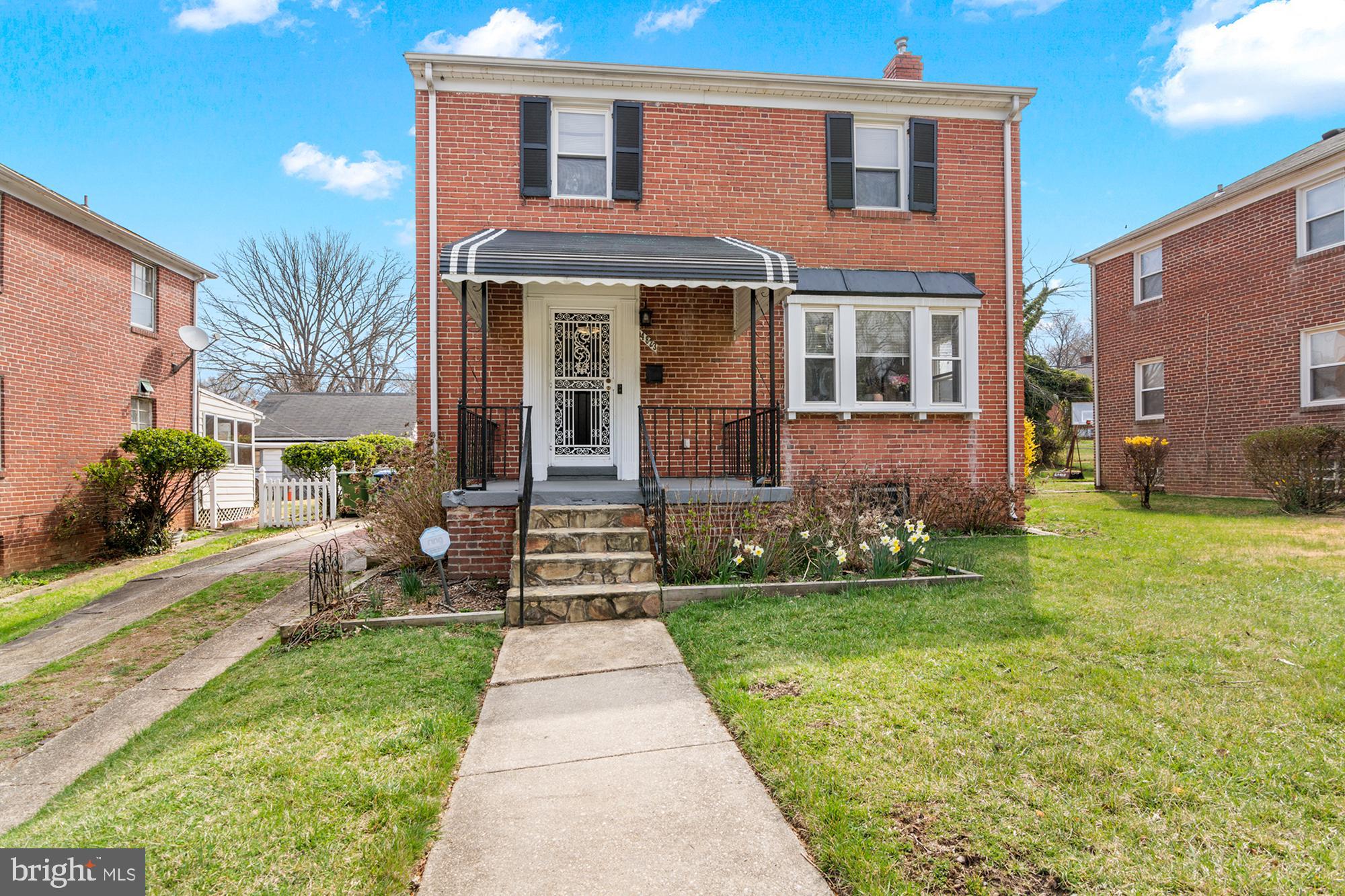 Experience this beautifully reimagined Lauraville classic, thoughtfully blending historic character with modern convenience. The original hardwood floors have been expertly refinished, and the open kitchen/dining layout creates an inviting flow on the main level—complete with a handy half bath. Downstairs, you’ll find a fully renovated lower level featuring a gorgeous full bath and a spacious laundry area. Step outside onto the expansive deck, ideal for entertaining, alongside a charming, retro-inspired carport—perfect for parking or a covered barbecue. Enjoy dual-zoned AC for year-round comfort, and take advantage of the generous yard space for outdoor fun. Located across from James Welling Park, this home captures the best of Lauraville living in one stylish, updated package.