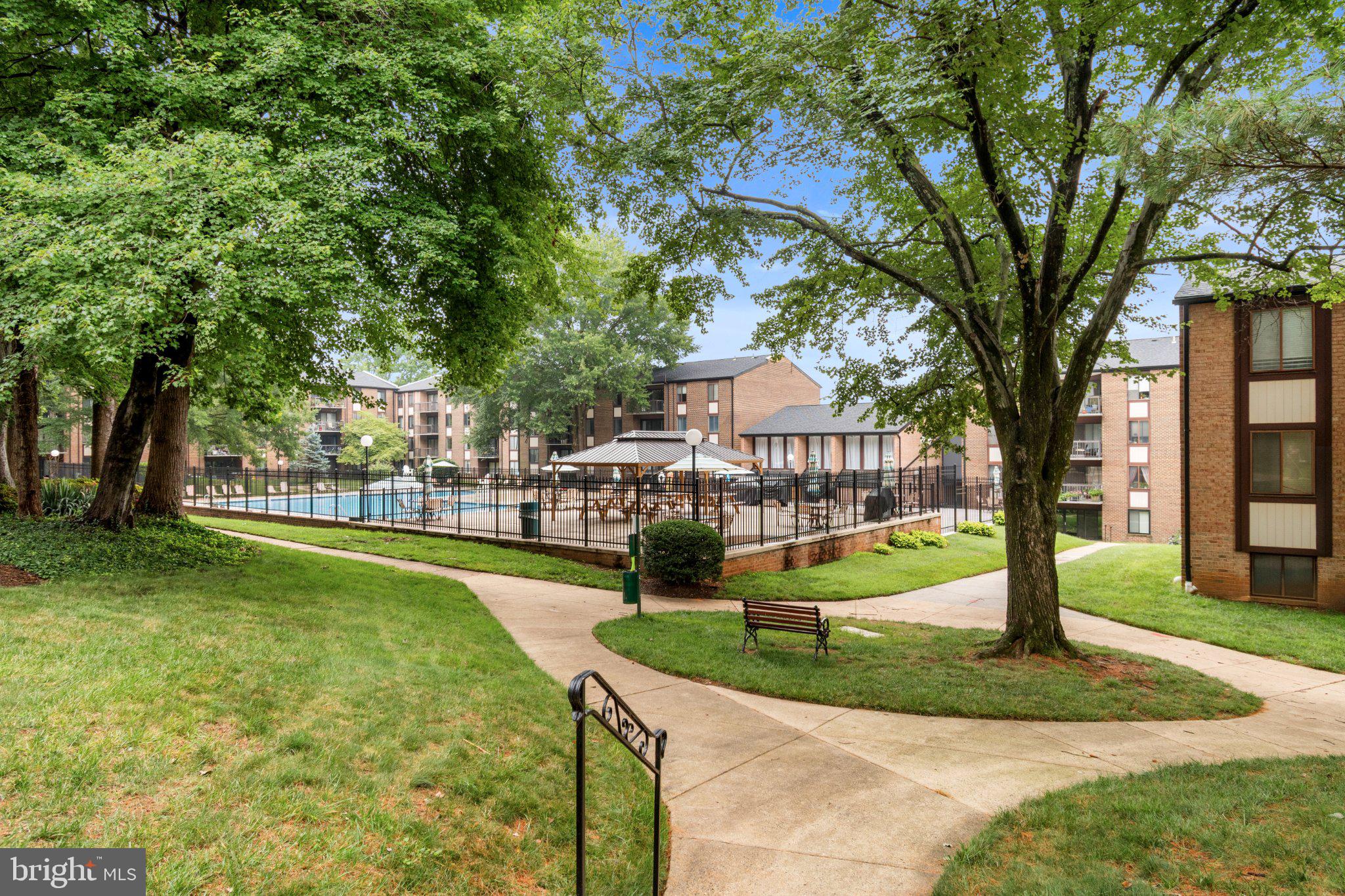 Discover the charm of Hawthorne Village, where comfort meets convenience in this inviting and perfectly proportioned 2-bedroom, 2-bathroom condo. Spanning 1,191 sq. ft. , this well-designed unit features upgraded granite countertops in a functional and attractive kitchen space leading to the dining area with serene landscaped and pool views, perfect for entertaining or restorative time at home.  Step outside to your large private balcony, where you can unwind and savour al fresco dining while taking in the views. Enjoy the ease of in-unit laundry with full-size washer and dryer.  Well-maintained property - the HVAC unit is brand-new!  The community offers fantastic amenities, including a sparkling swimming pool, tot lots for play, and beautifully maintained common grounds, fostering a sense of community and connection.   Ideally located, with convenient access to public transportation, including a free CUE bus stop just a short walk away and Vienna Metro station within a few miles. Major commuter options nearby include: Rt. 50, Rt. 29, I-66, 495.  Shopping, restaurants and service options are at your fingertips!  With an association fee that covers essential services like electricity, water, and exterior building maintenance, you can enjoy a hassle-free lifestyle. Don't miss the opportunity to make this delightful space your own!