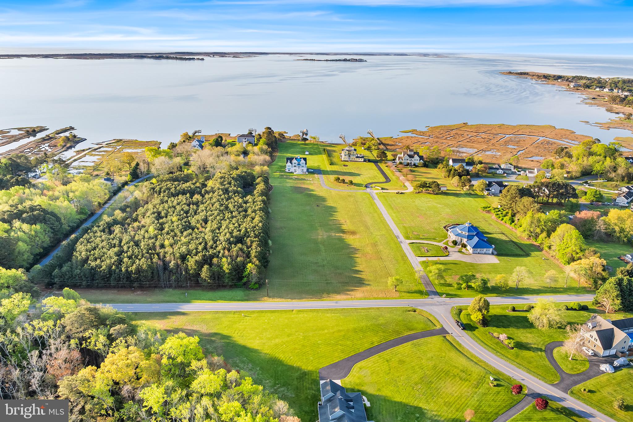 Scenic Waterview Lot located in the South Point community. Build the coastal home of your dreams on this stunning 2.3 acre tree lined lot. Offering breathtaking water views, this is a unique opportunity to create a custom estate. Set against a peaceful natural backdrop, this lot invites you to embrace all that tranquil living offers. Spend your days canoeing, kayaking, or jet skiing from the private community boat ramp, just moments from your doorstep. The lot offers existing home plans—saving you time and expense in your building journey. Located in one of the area’s most desirable communities, South Point offers close proximity to a golf course, marina access, and a peaceful, coastal setting just minutes from Assateague Island, Ocean City’s beaches, dining, and entertainment. Don’t miss this opportunity to design and build a truly one-of-a-kind waterview residence with and an unbeatable lifestyle. Contact us today for more details or to schedule a private tour of the property.