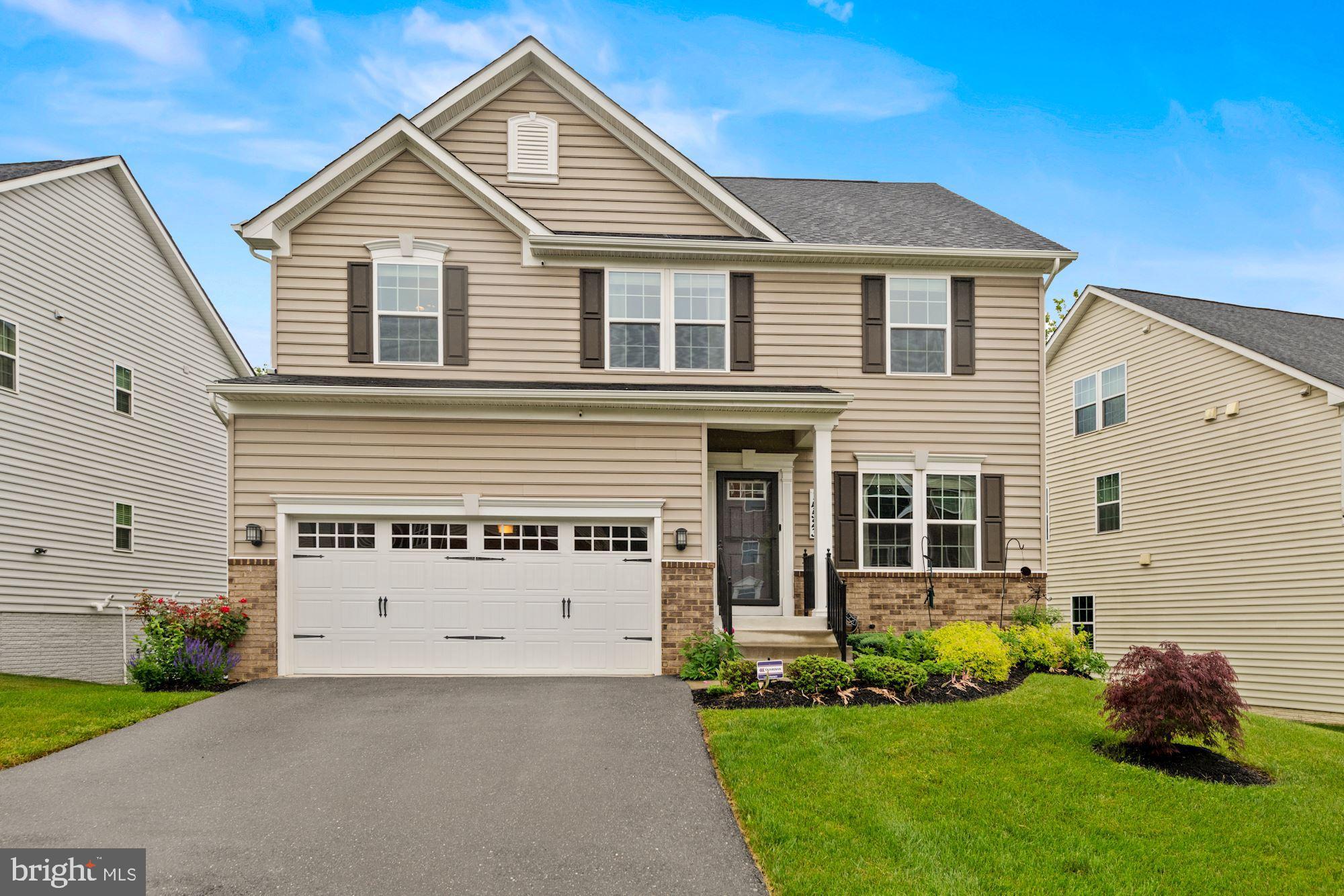Spectacular colonial in sought-after Bentley Park! It comes fully loaded. This home comes with high ceilings, wonderful light fixtures, a spacious family room with a gas fireplace, cable-ready and built-in surround sound, a fabulous kitchen with top-of-the-line steel appliances, and granite countertops plus a kitchen island. On the second level, you will find the ample principal bedroom with 2 walk-in closets and an en-suite full bath, three additional bedrooms, and a full bath in the hallway. The basement is fully finished and comes with a french door that leads to the backyard.  Attached two-car garage,  security system (home alarm and cameras) plus an app that connects to your phone to operate the garage door, Nest door ring with the camera, yard maintenance, and quarterly pest control comes included in the rent. Enjoy all the amenities this community has to offer: clubhouse, pool, walking and biking trails, Tot playground, and much more. Conveniently located near I-95, the ICC and Commuter Rail.