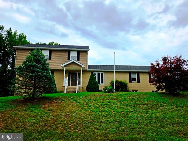 Welcome to this beautifully maintained **3-level Colonial** situated on a spacious **corner lot** in the desirable community of Owings, Maryland. Offering an exceptional floor plan with generous living space, this home features **4 bedrooms, 3.5 bathrooms**, and a fully finished basement designed for comfortable living and entertaining. **Just minutes away from Colonial Beach**

The **main level** offers a unique and functional layout featuring **three spacious bedrooms**, a full bathroom, a formal **living room**, elegant **dining room**, a bright **breakfast nook**, and a **large open kitchen** equipped with **stainless steel appliances**, abundant cabinetry, and ample countertop space. Step outside to the impressive **full-length rear deck** that spans the width of the home—perfect for entertaining, relaxing, or enjoying peaceful outdoor views.

Occupying the **entire upper level**, the private **owner's suite** serves as a true retreat, offering plenty of space for a sitting area, generous closet space, and a luxurious en-suite bathroom complete with a **soaking tub**, **separate shower**, and dual vanities.

The **fully finished basement** provides incredible flexibility with a **kitchenette**, an expansive recreation room, **two possible additional bedrooms or bonus rooms**, a full bathroom, and plenty of storage—making it ideal for extended family, guests, a home office, or an in-law suite.

Additional highlights include a **2-car attached garage**, a **circular driveway that wraps behind the home** providing abundant parking, and a beautifully sized corner lot offering privacy and curb appeal.

Conveniently located near shopping, dining, parks, schools, and commuter routes, this exceptional home combines space, functionality, and versatility. **Don't miss this rare opportunity to own a home with room for everyone in one of Southern Maryland's most desirable locations!**