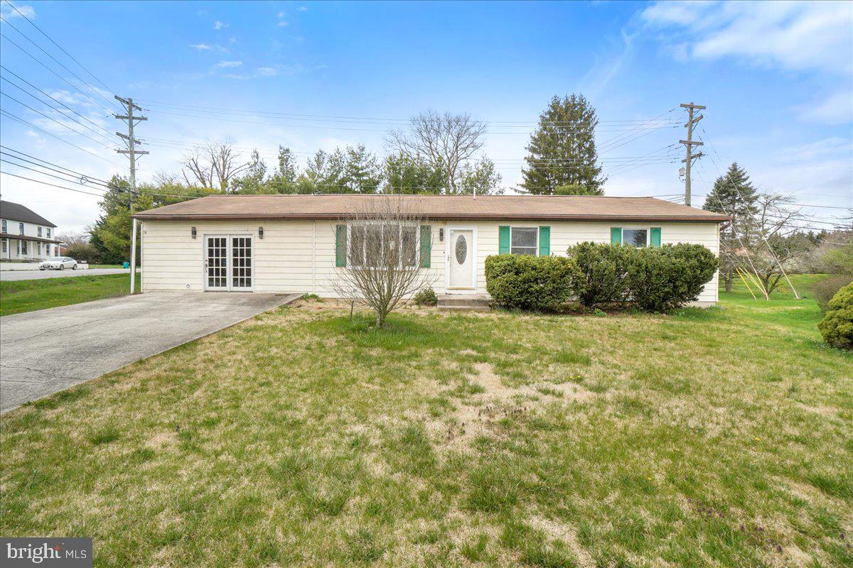 Welcome home to this North End gem! This fully renovated modern ranch is the perfect blend of style, comfort, and convenience, a fantastic opportunity in a great neighborhood. Arrive into a spacious open concept that seamlessly integrates the living area, brand new kitchen, and eat-in dining space. The thoughtful layout provides great flexibility for both indoor-outdoor entertaining and day-to-day living, with sliding glass doors leading out to the deck. The kitchen is a showstopper, featuring white Shaker cabinetry, granite countertops, and a suite of new stainless steel appliances to inspire your inner chef. The huge family room is a versatile space that can be tailored to multiple needs, whether you envision a cozy office nook, a play area, or simply a place to unwind and relax. Two generously sized bedrooms and two updated full baths ensure comfort and privacy for family or guests, with contemporary tile floors and vanities adding a touch of luxury. The large laundry and utility room is ready for your washer and dryer. And when it's time to enjoy the great outdoors, you'll love spending time on the front and rear lawns, soaking up the sun and fresh air. This home is move-in ready with fresh neutral paint throughout. All that awaits is for you to add your personal style and make it truly your own! Situated in a convenient and desirable location close to local shops, grocery stores, and amenities, this renovated North End ranch is the perfect place to call home.