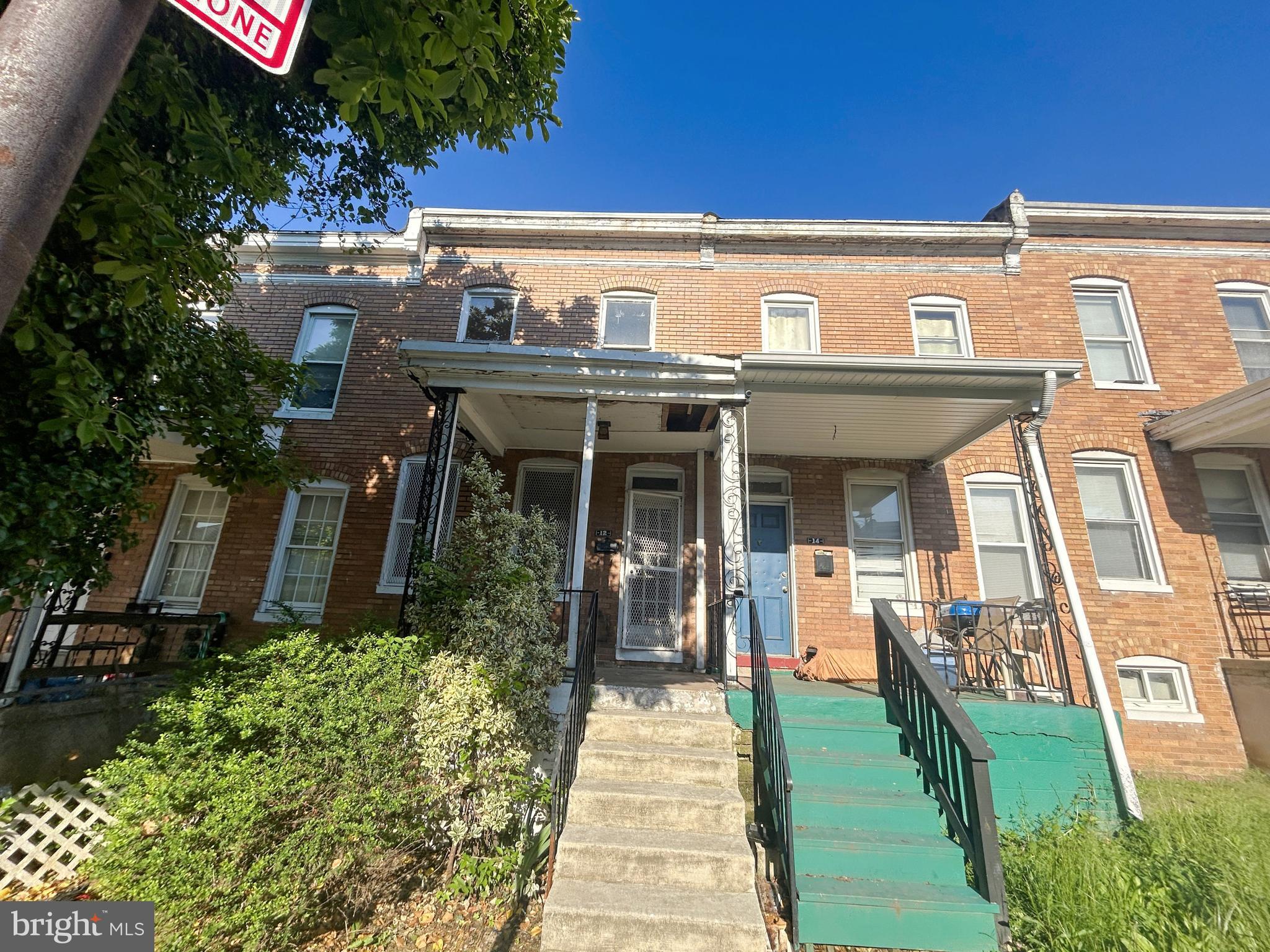 Discover an exceptional investment opportunity in the neighborhood of Carroll-South Hilton. Built in 1926, this townhome exudes character with its classic brick exterior and inviting interior spaces. Venture inside to find spacious living spaces with laminated plank flooring that flows throughout the main and upper levels. The separate dining room provides a cozy spot for formal gathering or casual meals, while the two well-appointed bedrooms offers relaxation after a long day. The full, unfinished basement offers endless possibilities, whether to transform it into a recreation room, home gym, or additional storage space. Enjoy the outdoors on your porch, perfect for morning coffee or evening relaxation. The rear fenced yard provides a private retreat for gardening or outdoor activities. This home is located in a prime area with easy access to parks and local dining, and few minutes away to Westside Shopping Center and Hollins Market. Don't miss this wonderful opportunity! Schedule a showing today!