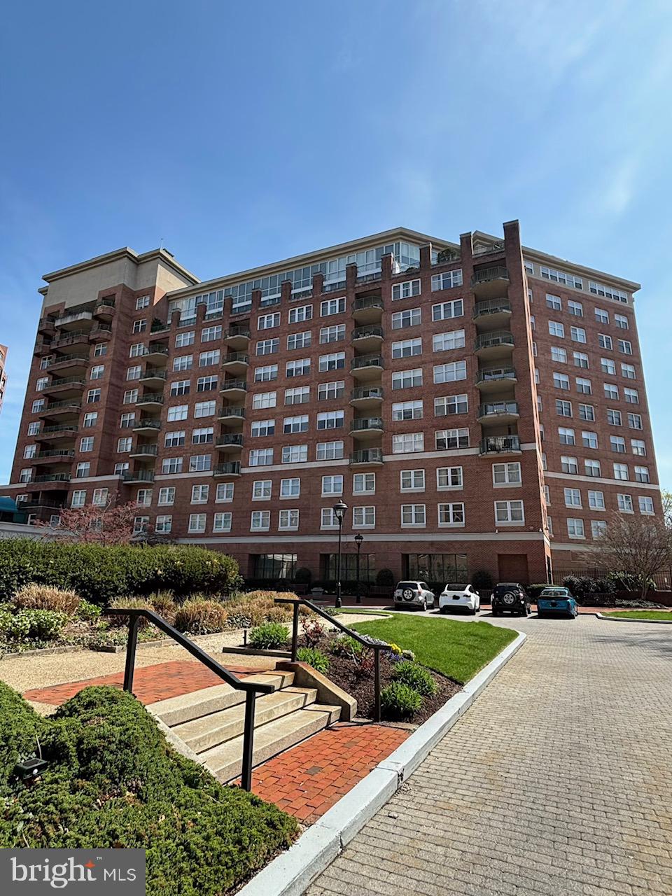 Homes that nurture. Enjoy easy, low-maintenance living in this peaceful condo across from Johns Hopkins University. Walk to restaurants, cafés, and shops while enjoying the security of controlled access, a private garage, 24/7 concierge and front desk service, and on-site management. The second bedroom features built-in Murphy queen bed and large desk, plus two closets, for instant move-in comfort. Guests can stay at the hotel next door. Comfort, convenience, and location come together beautifully in this exceptional home.