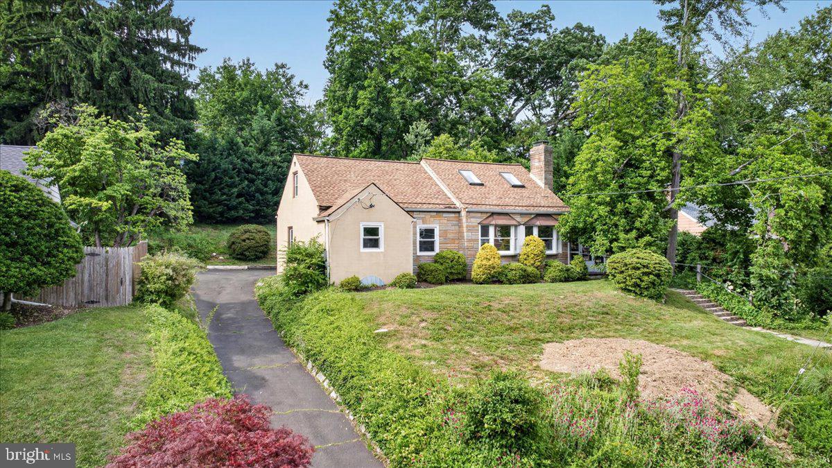 COMING SOON – 3D matterport is available on all platforms except Zillow :(  

Welcome to 250 Lismore Avenue, a charming stone Cape Cod offering the convenience of one-floor living with surprising space inside and out.

The main level features a spacious living room with fireplace, an updated kitchen with breakfast nook, dining area, two bedrooms, and a full bathroom—making everyday living possible without ever needing to use the stairs. Upstairs, you'll find a generously sized third bedroom plus a large bonus room that could serve as a home office, hobby room, exercise space, guest retreat, or additional living area.

The screened porch provides the perfect place to enjoy your morning coffee or unwind at the end of the day while overlooking the private backyard. A detached garage, long driveway, basement powder room, utility area, and dedicated laundry space add functionality and storage rarely found in homes of this size.

Lovingly maintained by the same owner since 2018, the home offers a move-in-ready interior, mature landscaping, and exceptional convenience. Located just minutes from regional rail, SEPTA, major roadways, shopping, dining, and Philadelphia, this is an ideal opportunity for commuters, downsizers, first-time buyers, or anyone seeking a home that combines character, flexibility, and accessibility.