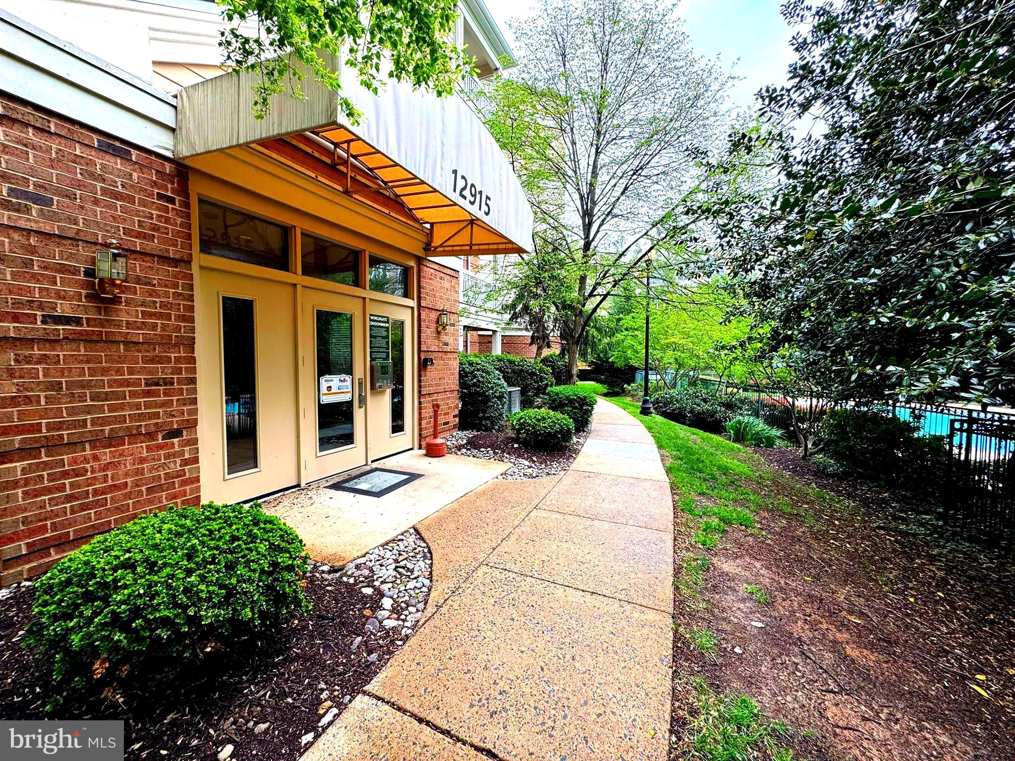 *******Updates throughout, beautiful flooring, new stainless steel appliances,  built-ins, and more!!  Condo fee includes water*********Welcome to 12915 Alton Square, APT 311, Herndon, VA 20170.  Situated just a short walk from the Herndon Metro Station, Amazon Web Services building, major commuter routes like the Dulles Toll Road and Route 28, and a variety of shopping and dining options located a short walking distance at the Worldgate Centre shopping center.  The shopping center includes approximately a dozen restaurants, a movie theater, and hotel, this location is perfect for those who want both comfort and accessibility.
This bright and spacious 2-bedroom, 1-bathroom condo offers the perfect blend of comfort, convenience, and modern living in the heart of Herndon. Located in the sought-after Worldgate Condo community, this home features a well-designed floor plan updated in 2019.  The unit is available unfurnished or if preferred, furnished for the next owner.
As you enter, you’ll be greeted by a large living area with recently updated kitchen with updated appliances, floors and a cozy fireplace—ideal for relaxing or entertaining guests. The private balcony offers a peaceful retreat, perfect for enjoying your morning coffee or unwinding after a long day.
The gourmet kitchen comes complete with quartz countertops, stainless steel appliances, and plenty of cabinet space for all your storage needs. The adjoining dining area includes new built-ins perfect for hosting family meals or intimate gatherings. 
The spacious master suite features a large walk-in closet. The second bedroom is also generously sized with ample closet space.
This home includes a recently replaced full-sized washer and dryer for your convenience, as well as two parking spaces. Residents of Alton Square enjoy a host of amenities, including a community pools, fitness center, and clubhouse.
Don't miss your chance to own this fantastic condo—schedule your showing today!