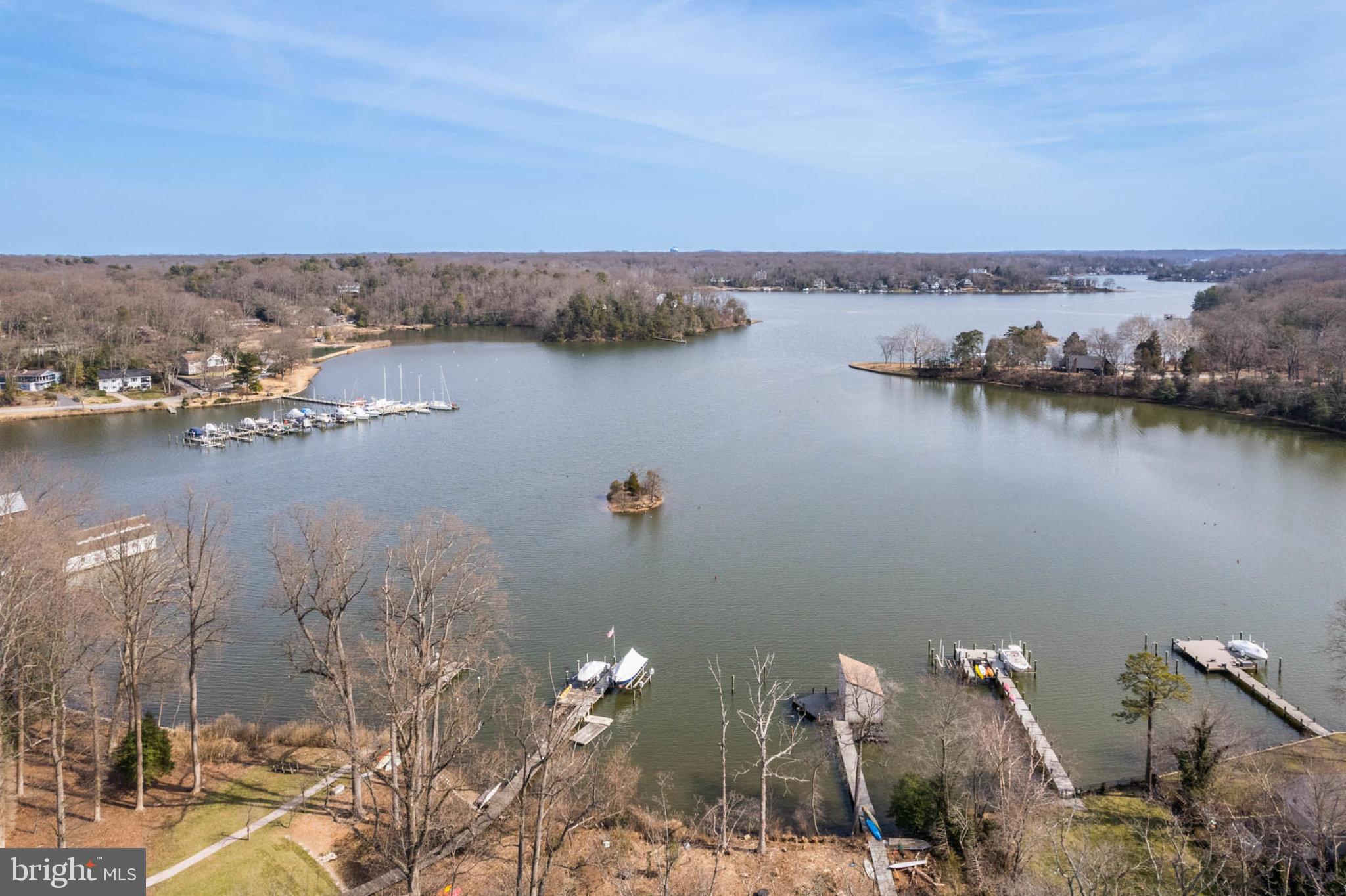 OFFERS SHALL BE PRESENTED AS RECEIVED AND SELLER RESERVES THE RIGHT TO ACCEPT AN OFFER AT ANYTIME.   HOUSE IS BEING SOLD "AS IS".  HOUSE IS NOT READY TO BE VIEWED BUT BUYERS CAN WALK THE LOT WITH A SCHEDULED APPOINTMENT AS THE VALUE IS IN THE LAND. 
 REMARKABLE OPPORTUNITY TO BUILD YOUR DREAM WATERFRONT IN THE SOUGHT AFTER COMMUNITY OF POINT FIELD LANDING!  DOUBLE LOT, OVER 6,000 SQ FT WITH A BOAT HOUSE ON THE SEVERN!  INCREDIBLE VIEWS AS THIS HOME IS SITUATED ON THE LEFT SIDE OF POINT FIELD DRIVE LOOKING UP THE SEVERN WITH 145 FT OF WATER FRONTAGE. VALUE IS IN THE LAND UNLESS SOMEONE WOULD WANT TO DO RENOVATION.   5 BEDROOM, 5 AND A HALF BATHS.  PREMIERE WATERFRONT COMMUNITY WITH SOME OF THE MOST AMAZING HOMES IN THE AREA IN THE SEVERNA PARK SCHOOL DISTRCIT.  INTERIOR PHOTO'S TO COME.  CONFIRMING YOU CAN HOOK UP TO PUBLIC SEWER -UNBELIEVEABLE LOCATION!