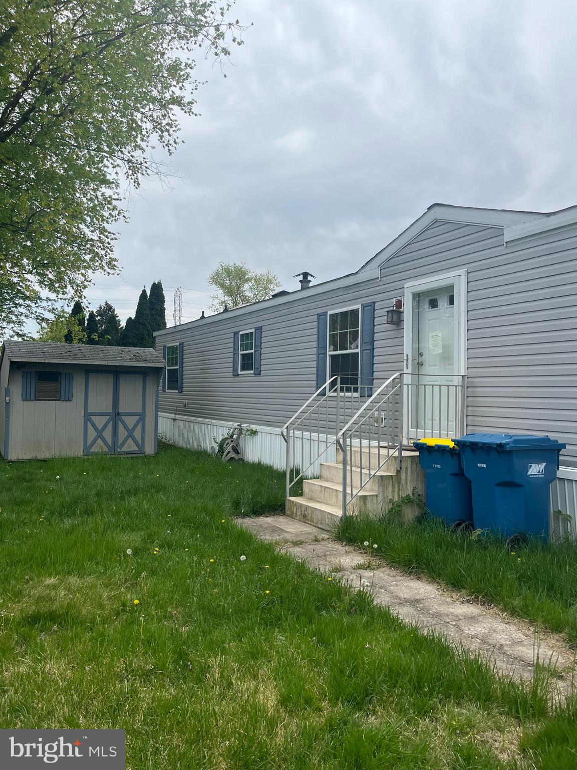 Potential Buyer Must be Approved through Pennwood Crossing  before an offer will be accepted.  
Located in a quiet, convenient community this property offers a perfect opportunity  featuring 3 bedrooms, 2 full baths.   Eat-in  kitchen provides double sinks, lots of countertop space, refrigerator, dishwasher,microwave stove/oven, plenty of cabinet space and flows nicely into spacious living area.   Conveniently located is washer/dryer, pantry and an additional bedroom.  Outside there is a custom  shed for additional storage.   Buyers must be approved by Pennwood Crossing after Agreement of sale is executed.  Financing accepted is cash/and or mobile home financing (different than a typical mortgage lender).  Buyer is responsible for all U & O requirements that Falls Township requires or any other requirements.  Being sold in "as is" condition.  Seller will make no repairs.