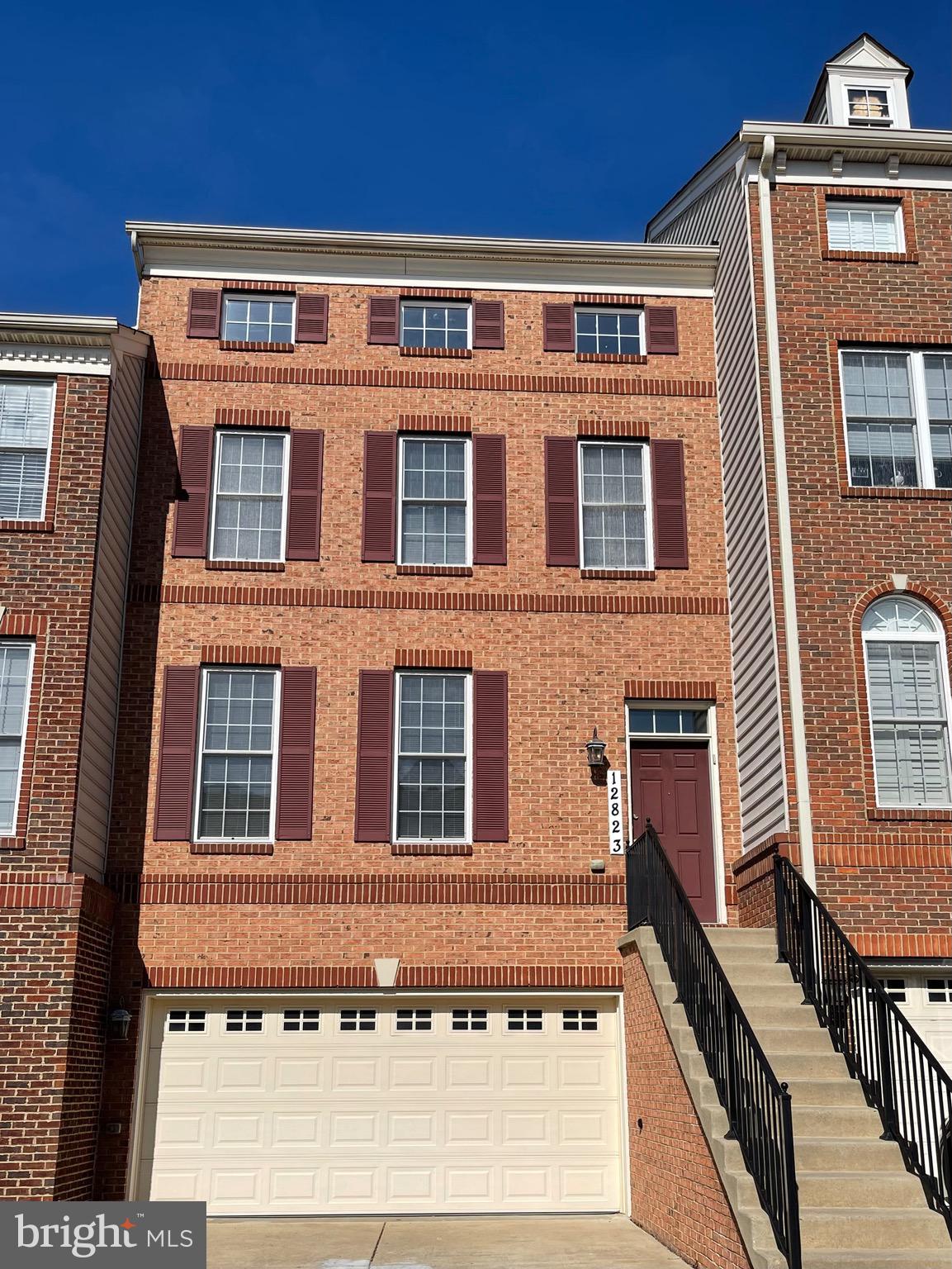 Spacious 4 level garage townhome.  Main level features kitchen, living and dinning room.  Upper level one with 3 bedroom and 2 full bath.  Large loft with skylights.  Deck backs to the trees.  2 attached garages.  Convenient location to shoppings and highway.