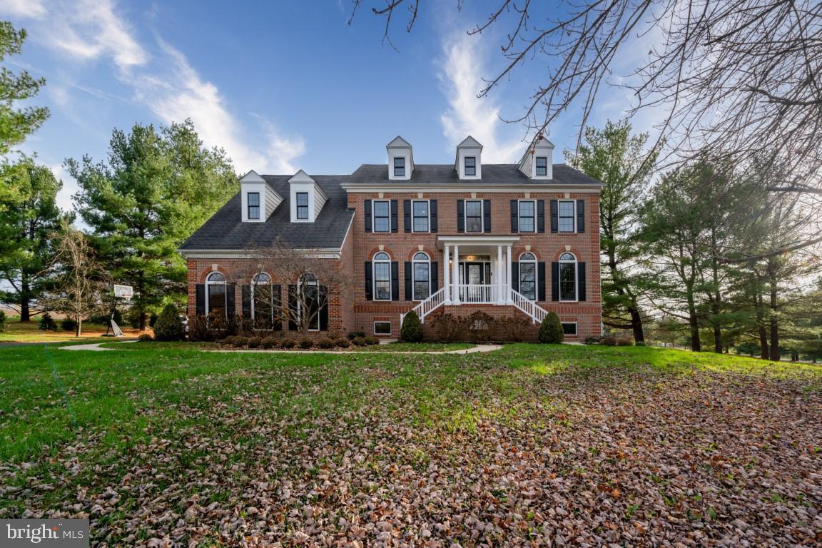 PROPERTY UNDER CONTRACT; SELLER ACCEPTING BACKUP OFFERS.  
Welcome to 11927 Meadow Vista Way, a stunning luxury single-family home nestled on a corner lot in Clarksville, MD. This magnificent residence boasts architectural grandeur with columns, crown moldings, and high ceilings, offering a total of 5768 square feet of living space.

Upon entering, you'll be greeted by panoramic views and an abundance of natural light streaming through the wall of oversized windows. The interior features a seamless blend of carpet and hardwood floors, creating an inviting ambiance throughout. The main level encompasses a formal dining room, a home office, and a library/den, perfect for both relaxation and productivity.

The heart of the home is the recently updated, spacious kitchen, complete with custom, imported appliances and a breakfast area. The family room features a cozy fireplace, ideal for gatherings and entertainment. On the second and third floors, you'll find five bedrooms, including a luxurious primary ensuite with a separate shower and a jetted tub, as well as walk-in closets and a double sink vanity.

The lower level is a fully finished space complete with an additional bedroom and kitchen. From here you walk out to almost 6 acres of your cleared and level private lot that offers a sense of seclusion and exclusivity. The perfect canvas for creating your dream property!

Don't miss the opportunity to own this exquisite home with a perfect blend of elegance and comfort. Schedule your private tour today and experience luxury living at its finest.