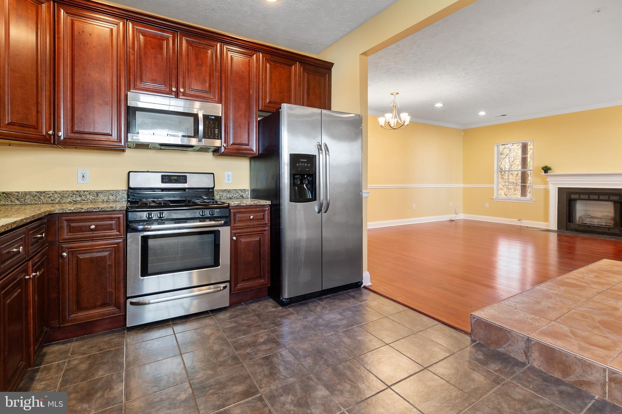 Amazing move in ready 2 bedroom 2 bathroom end unit condo. Large kitchen and living room with windows throughout. Enjoy the privacy and views of having the woods right behind the home while having easy access to the beltway, metro stations, bus lines, shopping and restaurants. This home also qualifies for a $10k grant and comes with 2 assigned parking spaces right in front. Schedule your tour today!