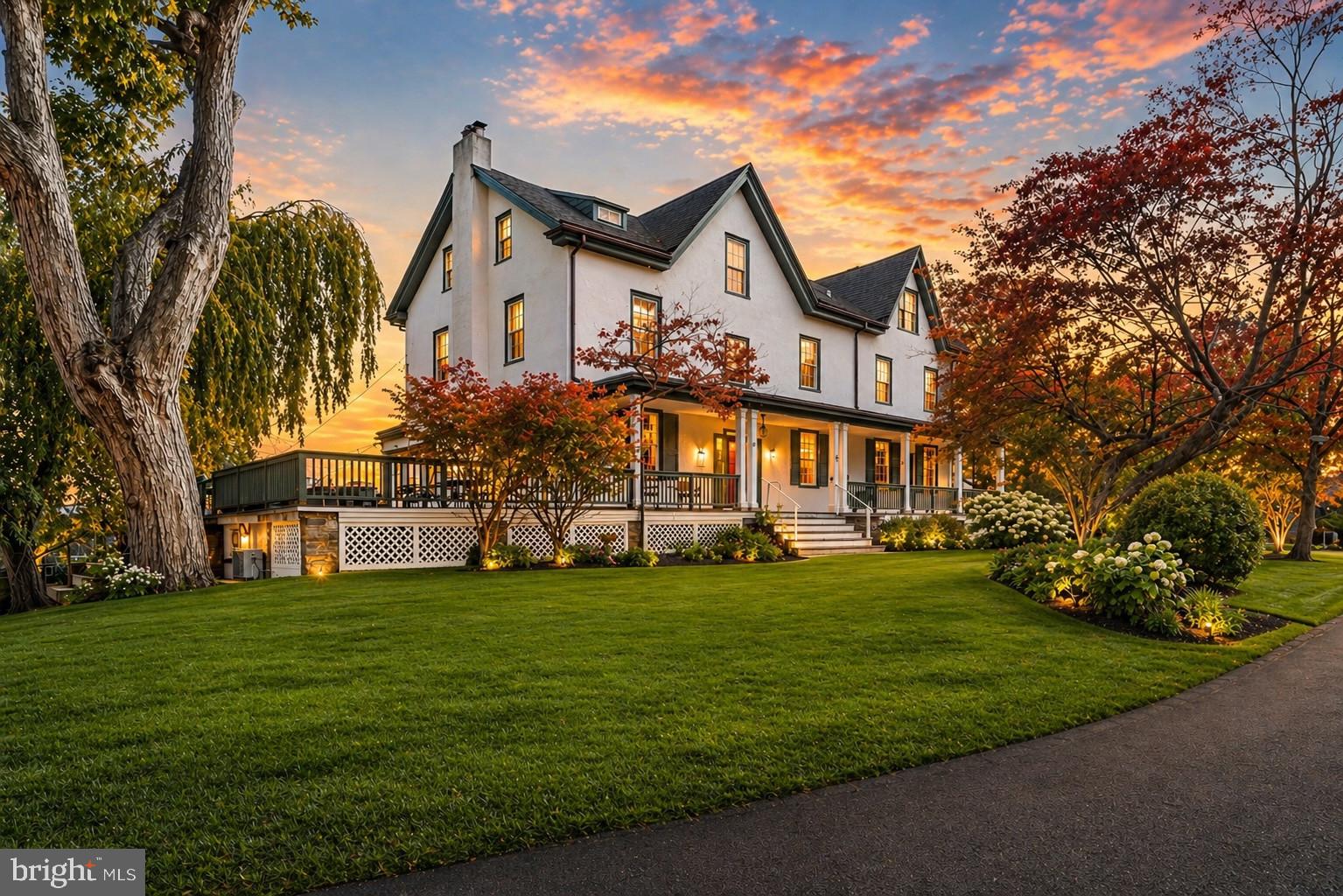 Set quietly on over 1.3+ lush acres in the heart of Newtown Square, “The Edgar House” stands as a rare piece of American history you can actually live in. Originally built in 1840 and expanded again in 1910 and 2008, this Federal-style home carries the strength and craftsmanship of another era, with thick stone walls, real wood floors, detailed crown moldings, and multiple fireplaces that give it a warm, grounded feel the moment you step inside. It’s a big house, nearly 9,000 square feet across three full stories plus a finished basement, offering 6 bedrooms, 8 bathrooms, and a layout that simply makes sense whether you are raising a family, running a business, or creating something of your own. There is character here you cannot replicate, from the front and back staircases to a rare interior smoke room that nods to the home’s past, balanced with practical upgrades like an updated shingle roof and a Viking gas appliance package in the kitchen. The great room layout opens things up for everyday living and entertaining, while two ensuite primary bedrooms provide comfort and flexibility. Outside, a 1,600-plus square foot wraparound deck and patio overlook mature landscaping, creating a setting that feels private, usable, and built for gathering. The circular driveway and detached three-car climate-controlled garage give the property both presence and function, while a separate office space opens the door for a home-based business or creative use. There is even room to expand, whether that means adding onto the home or building a second structure. This is not just a home; It’s a local landmark with real substance behind it. For the buyer who sees opportunity or for the buyer who owns a business, this property offers more than just space. It offers the chance to own something meaningful, improve it, personalize it, and build long-term equity in one of Delaware County’s most respected locations.