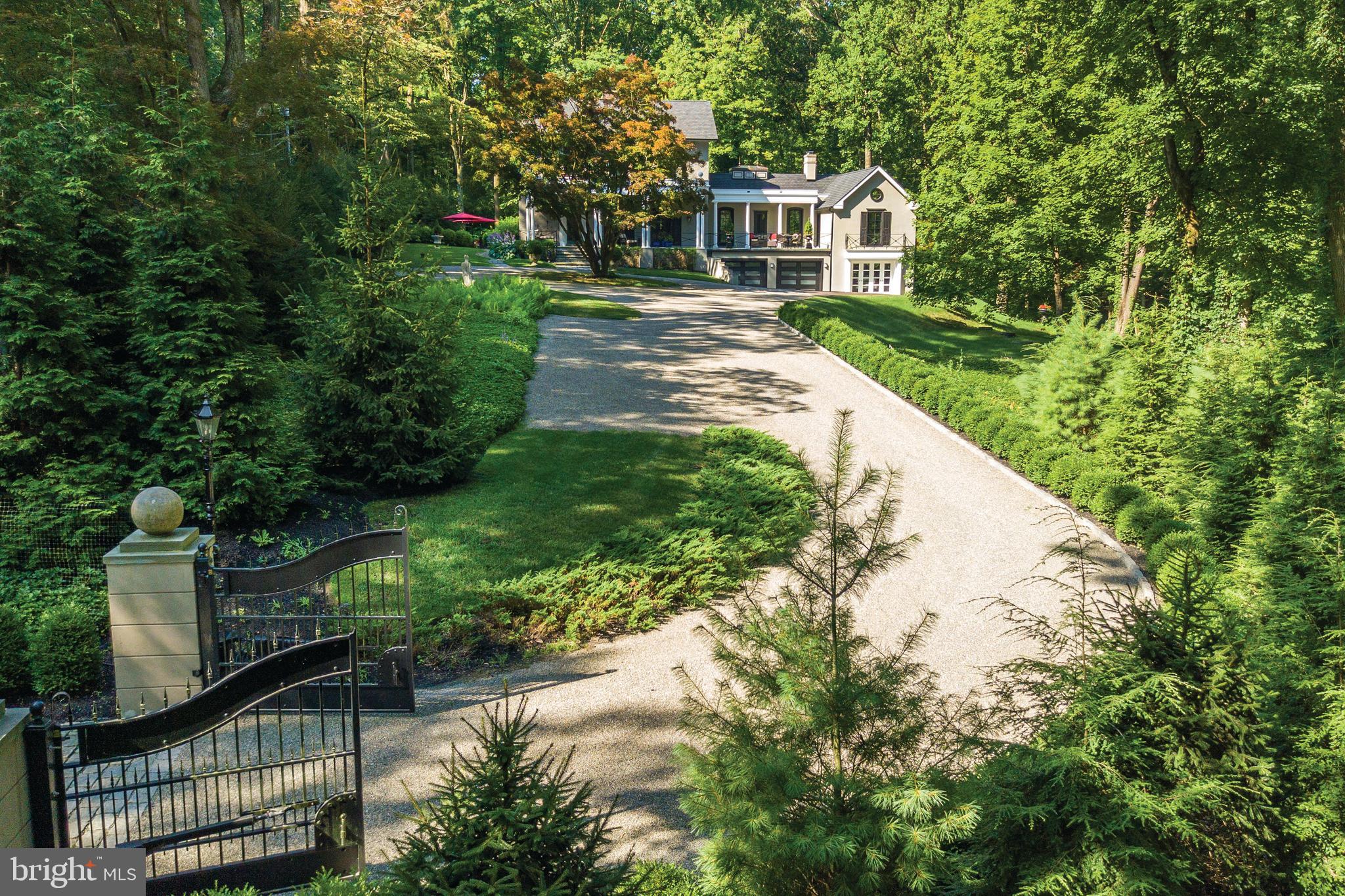L’ Ecole – Built in 1858 is a rare historic gem refurbished with stylish, contemporary finishes for a luxurious, modern ambiance.  A masterful repurposing of the historic Green Hill School in the New Hope/Solebury School District, this exquisite residence offers a seamless blend of historic charm and modern luxury. Situated on over 5 acres of lush, private grounds with a gated entrance, the property provides unparalleled privacy and serenity. This stunning home features 4 spacious bedrooms, 4 full baths and 1 half bath, along with a second kitchen and expansive living spaces - perfect for entertaining or family gatherings. Outdoors, enjoy a saltwater pool set amidst beautifully landscaped grounds, terraces and a lovely pond creating a perfect oasis for relaxation and recreation.   Enjoy Bucks County's reputation as a tax  refuge for New York and New Jersey residents with easy access to both.  Located just 70 minutes from NYC, 60 minutes to Philadelphia, 30 minutes from Princeton and only 10 minutes to New Hope, this exceptional one-of-a-kind property combines tranquility with convenient access to major cultural and urban centers. With its historic roots, luxurious amenities and private setting, L’Ecole is a true retreat for those seeking elegance, comfort and exclusivity.