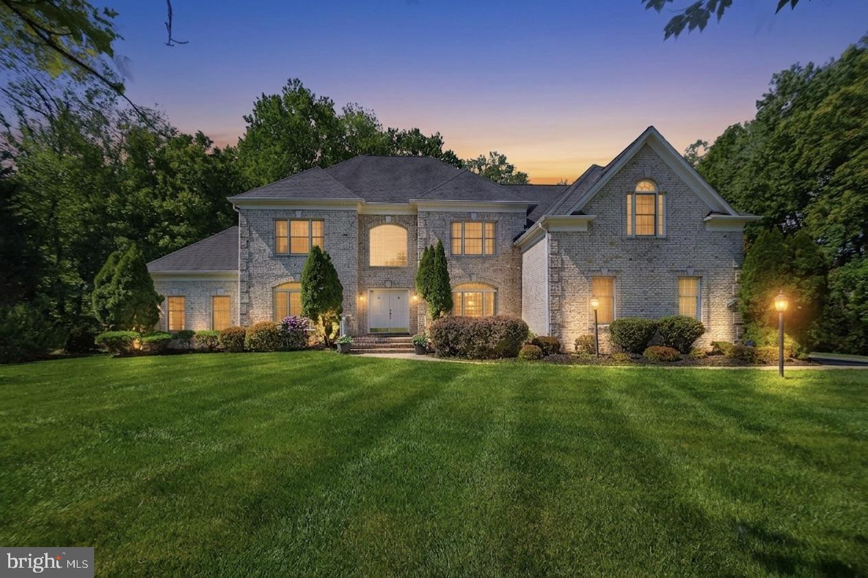 Unbeatable location and everyday convenience define this Great Falls estate offering over 7,400 finished square feet. Inside the coveted Langley High School pyramid and on a charming cul-de-sac in Wolf Trap Estates, you're just minutes from Tysons Corner, Dulles Airport, and the Metro. 

Inside, a dramatic two-story foyer and staircase open to a grand family room anchored by a brick raised-hearth fireplace. The stepped living room flows into a bright sunroom. A country kitchen, library, and formal dining room round out the main floor. Upstairs, an enormous primary suite is a true retreat: generous sitting area, en-suite bath, and walk-in closet. The fully finished walk-out lower level adds living space plus expansive storage. Owners have thoroughly maintained and thoughtfully updated: a refreshed kitchen with new appliances, several renovated bathrooms, refinished hardwood floors.

Outside, the front and back yards are spacious and tree-lined. The property borders and backs up to wooded HOA acreage. Owners rebuilt the composite deck, repaved the driveway, and installed new garage doors. This home is a rare combination of convenience, prestige, and value. The listing agent is related to the sellers.