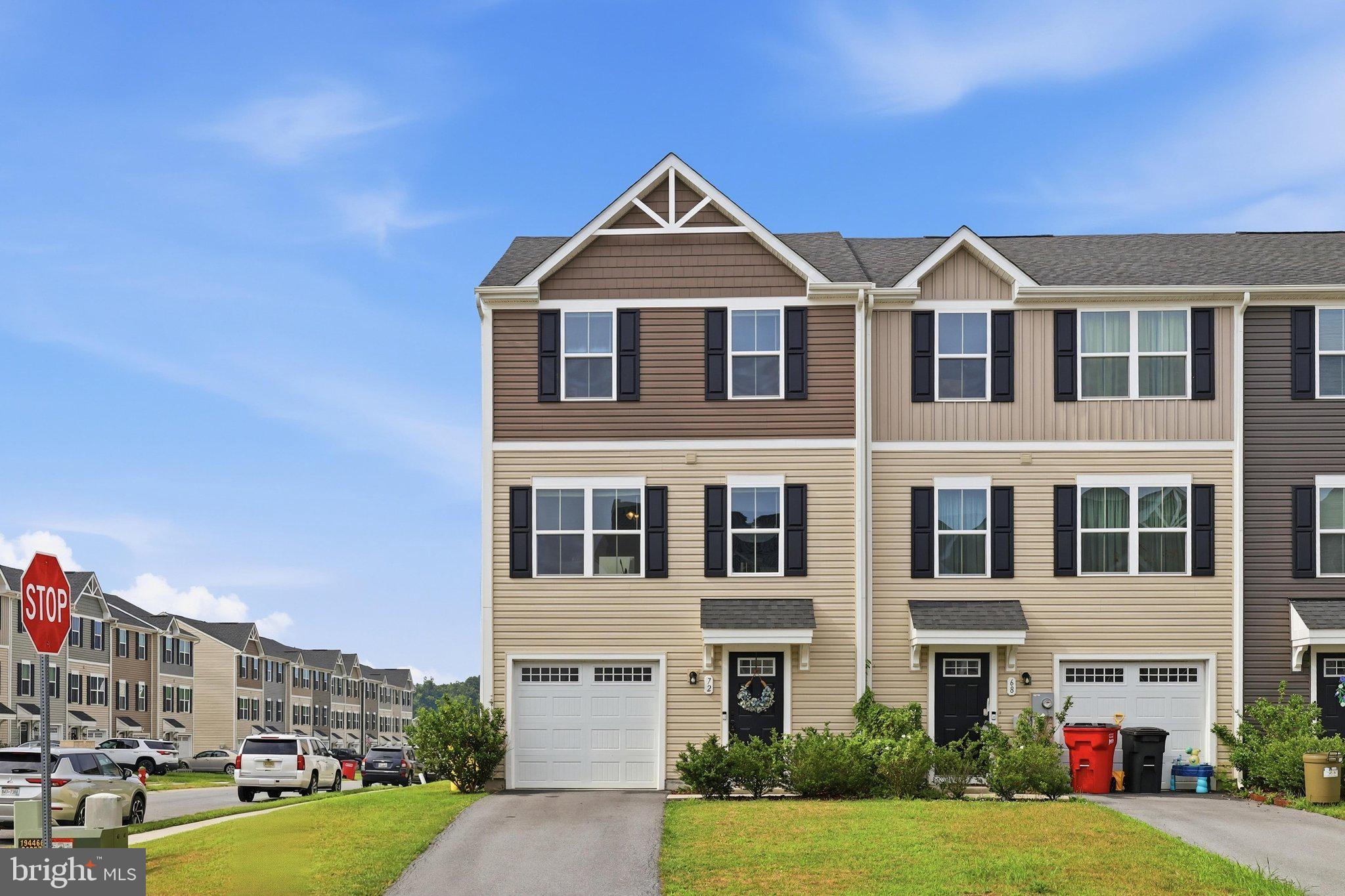 Beautifully maintained end-unit townhome offering the perfect combination of comfort, style, and convenience! Built in 2020, this move-in-ready home features 3 spacious bedrooms, 2.5 bathrooms, and a bright, open floor plan designed for everyday living. The well-appointed kitchen flows seamlessly into the dining and living areas, creating an inviting space for both relaxing and entertaining. Upstairs, the generous primary suite includes a private full bath, while two additional bedrooms and another full bath provide plenty of room for family, guests, or a home office. Step outside to the rear patio—perfect for grilling, enjoying your morning coffee, or unwinding after a long day. As an end unit, you'll appreciate the added privacy, extra natural light, and additional outdoor space. Conveniently located close to shopping, dining, commuter routes, and everyday amenities, this well-kept home is ready for its next owner. Schedule your private showing today!