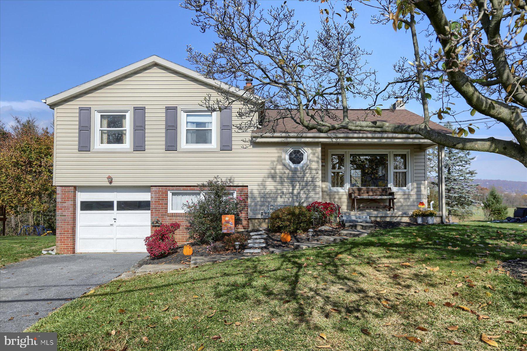 This sweet split-level residence boasts 4 bedrooms, including a unique captive bedroom, perfect for various uses like a cozy home office or guest room.  The home features a host of recent upgrades, including a newer roof, siding, windows, and doors and full bath.  Inside, enjoy the comfort of forced air heating powered by an efficient natural gas furnace and stay cool in the summer with central air conditioning. 
Storage will never be an issue, thanks to the abundance of space throughout the house. The unfinished basement, flooded with natural light, offers a fantastic opportunity to create additional living space tailored to your needs and preferences.  The laundry is located just inside the rear door.  Car enthusiasts and hobbyists will appreciate the oversized deep garage, providing ample room for vehicles, tools, and projects. Step outside into the spacious backyard, which features a large level yard, perfect for outdoor activities and gatherings. Relax on the concrete patio, ideal for barbecues and enjoying the  surroundings. Additionally, there's a convenient garden shed for all your gardening tools and equipment.   Don't miss the chance to make this house your home sweet home.
