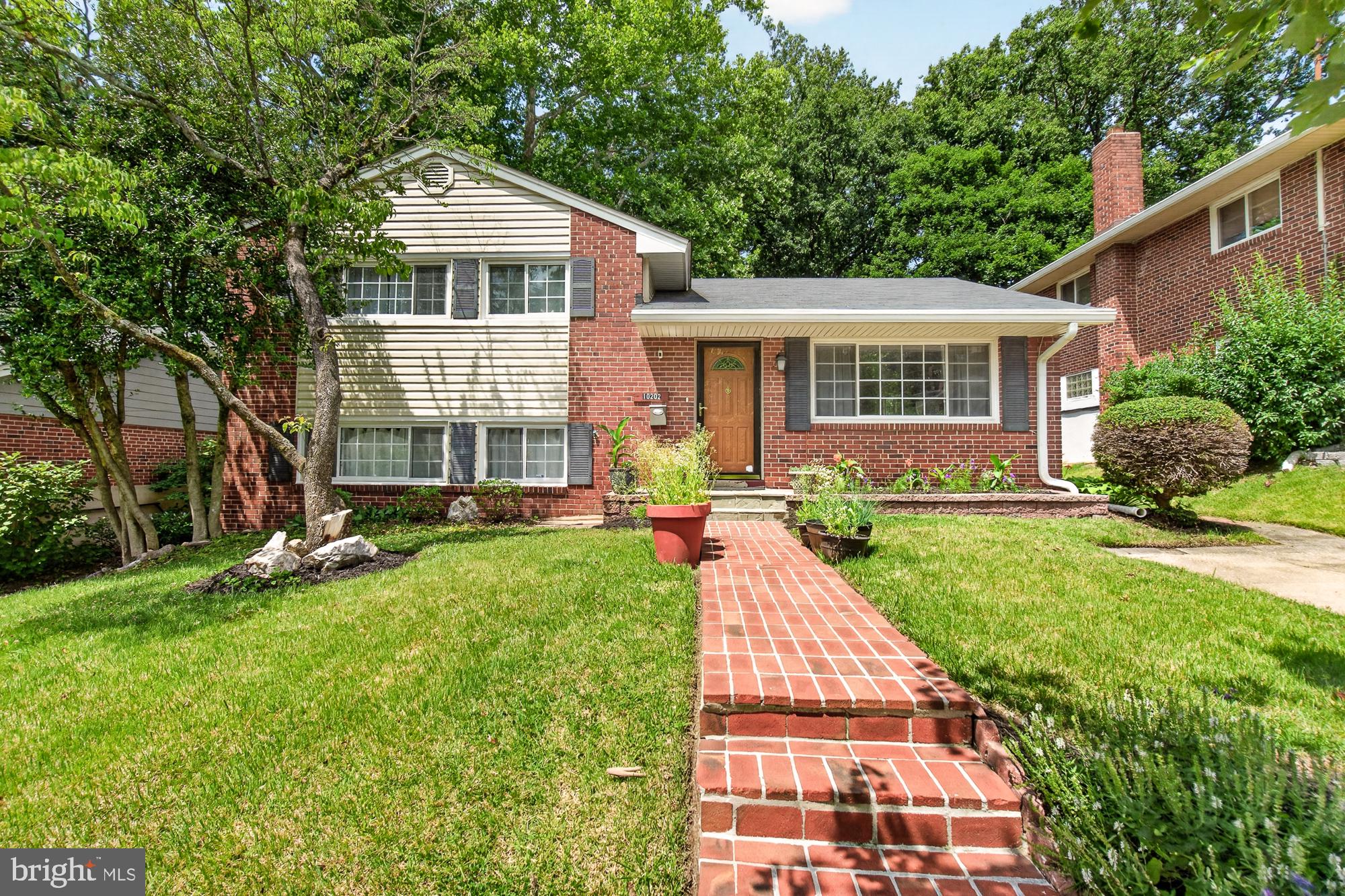 Nestled in the serene enclave of Carroll Knolls, this exquisite split-level residence embodies the perfect blend of timeless elegance and modern comfort. Built in 1956, this charming brick home has been thoughtfully designed to cater to a lifestyle of luxury and ease offering tons of beautifully finished living space. As you step inside, you are greeted by a warm and inviting atmosphere that flows seamlessly throughout the home. The spacious layout features three generously sized bedrooms and three and a half bathrooms, providing ample space for relaxation and rejuvenation. Each room is bathed in natural light, especially the sunroom addition!  The thoughtful design ensures that every corner of this home is utilized to its fullest potential. The exterior of the property is equally captivating, set on a well-manicured 0.15-acre lot that provides a perfect backdrop for outdoor enjoyment. The lush surroundings invite you to create your own outdoor oasis, whether it be a tranquil garden or a vibrant patio for al fresco dining. Parking is a breeze with a convenient driveway, ensuring that you and your guests always have easy access. The location in Carroll Knolls offers a peaceful retreat while still being just moments away from vibrant local amenities, dining, and shopping. This home is not just a residence; it's a lifestyle. Experience the charm of a well-established neighborhood, where community and comfort come together. With its classic style and modern conveniences, this property is a rare find that promises to be a cherished sanctuary for years to come. Discover the perfect blend of luxury and warmth in this stunning Carroll Knolls home, where every detail has been crafted to create an inviting and sophisticated living experience. Embrace the opportunity to make this exquisite property your own and enjoy the lifestyle you've always dreamed of.