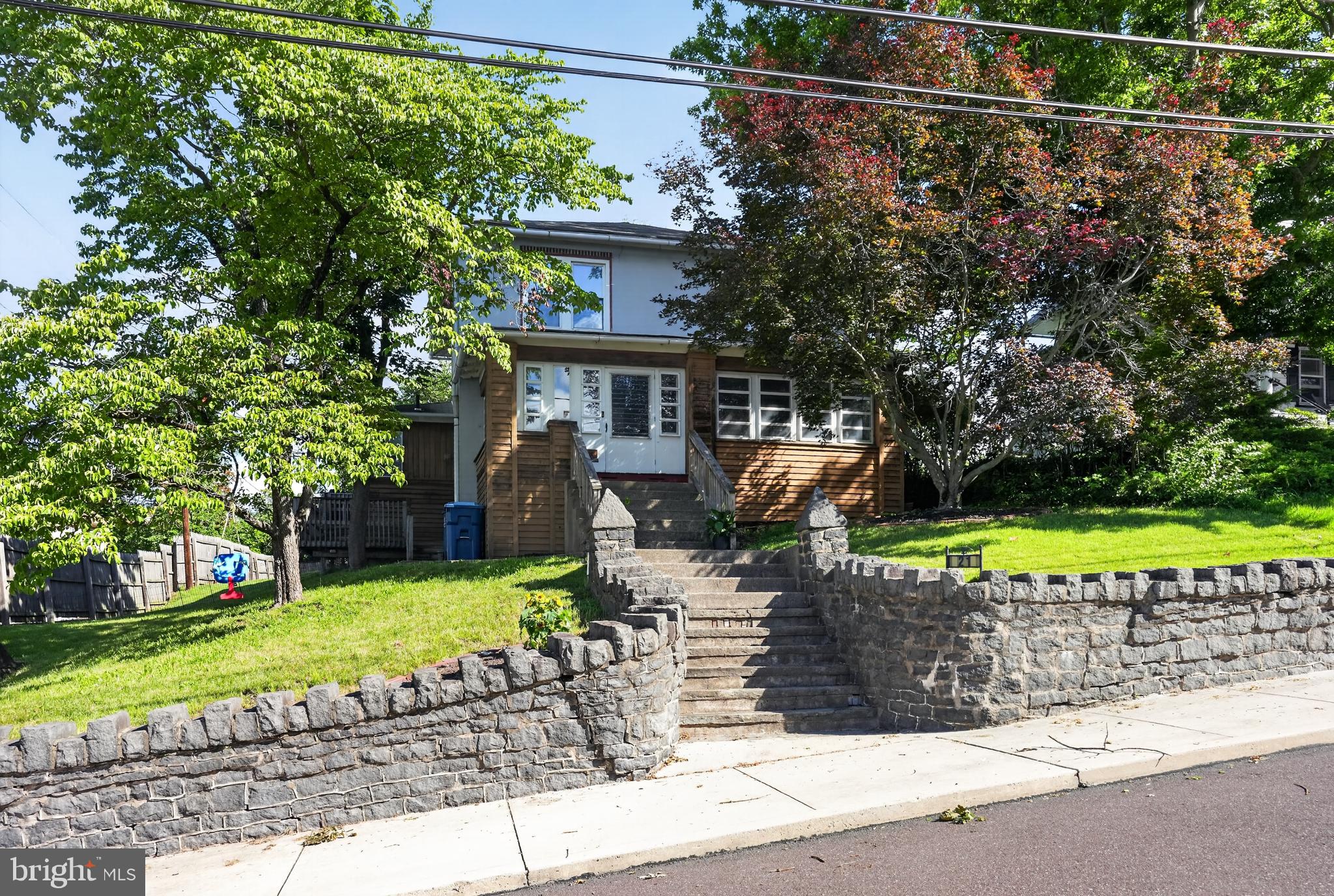 Don't miss this beautifully maintained Borough single-family home offering the perfect blend of timeless character and modern updates. With 4 bedrooms, 1.5 bathrooms, and countless improvements throughout, this home is truly move-in ready while preserving its original charm. From the moment you arrive, you'll be welcomed by classic Belgian block steps leading to the inviting enclosed front porch—an ideal spot to relax with morning coffee or unwind in the evening. Original wood doors with crystal doorknobs and beveled glass, rich natural woodwork, and hardwood floors showcase the home's historic character, while thoughtful updates provide today's modern conveniences. The spacious living room spans the length of the home and is filled with natural light. The formal dining room flows seamlessly into the updated kitchen, featuring granite countertops, stainless steel appliances, tile flooring, a bay window, and a cozy dining area. A beautifully remodeled half bath completes the main level. Upstairs, you'll find four generously sized bedrooms, each with hardwood flooring and ample closet space. The full bathroom has been completely renovated down to the studs and features a stylish vanity and updated finishes. The backyard offers plenty of space for entertaining or relaxing and leads to an oversized detached one-car garage. The basement provides even more functional space with a endless potential as it is partially finished. Combining classic Borough charm with extensive updates and flexible living space, this home is ready for its next owner. Showings start Saturday at the Open House!