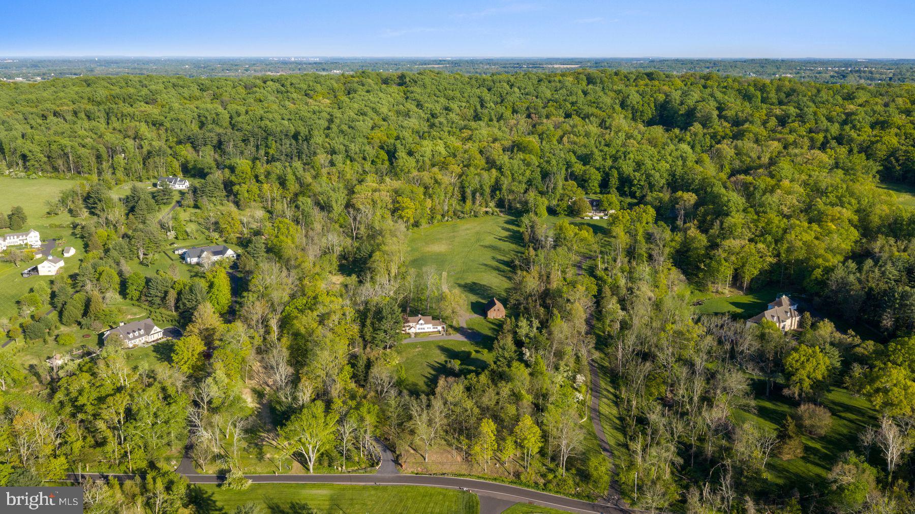 Incredible opportunity to create your Bucks County estate property on one of Upper Makefield's most idyllic roads.  Use the existing home, at it's core, a 1800s stone farmhouse, as your guest cottage, and build your dream house at the edge of the clearing to enjoy absolutely breathtaking long distance views.  There's a great post and beam barn that would make an excellent entertainment barn, private studio, or office.  The property is owned by Zaveta Custom Homes, Bucks County's premier builder for over 40 years, and price to build starts at roughly $700 per square foot - the list price reflected is for the land only.