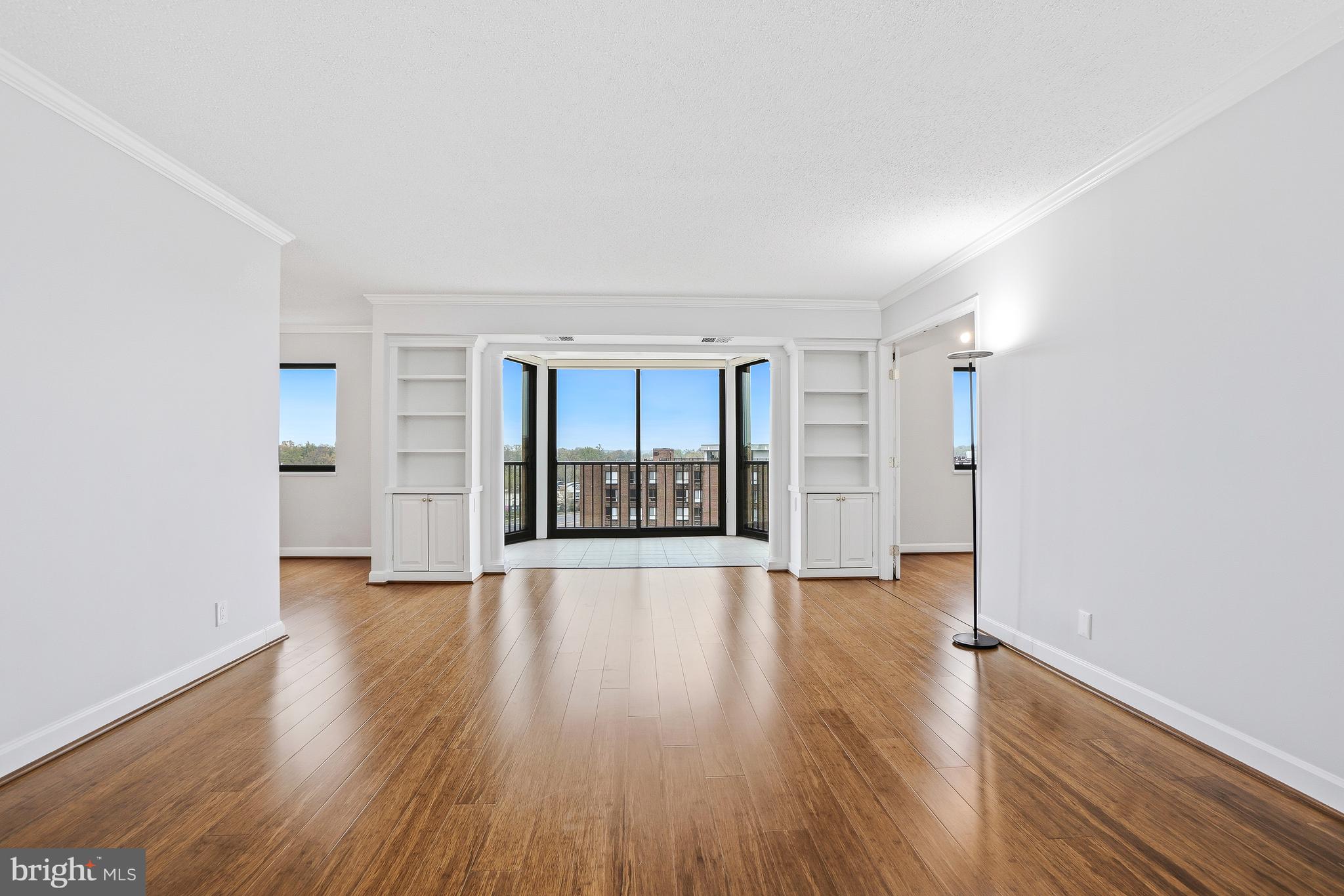 WELCOME HOME to 5904 MOUNT EAGLE DRIVE, #718 at MONTEBELLO, -- the area's premier "AWARD-WINNING" luxury condominium. •3-BEDROOMS/2-FULL BATHS "END-UNIT" w/GARAGE PARKING. The largest of all non-combined units w/the feel of a single-family home. 1,695 sq.ft. PLUS, an approximate 190 sq.ft w/TWO SUN/FLORIDA ROOMS/SCREENED-PORCHES, --TOTALING APPROXIMATELY 1,885 SQUARE FEET OF LIVING SPACE! Features large room sizes, w/each bedroom having at least one walk-in closet. Overlooking Montebello's woodlands, w/PREMIUM SOUTHERN EXPOSURE and even partial VIEWS OF THE POTOMAC AND NATIONAL HARBOR! •MOVE-IN READY: Including beautifully renovated kitchen and baths, upgraded HVAC, electrical, wood flooring, crown molding, freshly painted and more! •ENTRY FOYER: Large and open w/two mirrored closets. Notice that #718 is at the end of the building hallway, -- thus offering additional quiet and privacy! •LIVING ROOM: Features custom built-in bookcases. Extra spacious w/more than ample wall-space for optimal placement of sofa and entertainment center.  •SUN/FLORIDA ROOM/SCREENED PORCH #1: Overlooks Montebello's woodlands, w/PRIME SOUTHERN EXPOSURE! Perfect for pets and plants. •DINING ROOM: Easily accommodates table for 8 to 10, w/space for buffet and china cabinet. •KITCHEN: Features upgraded cabinetry and countertops, very practical/functional layout, w/plenty of workspace, cabinets, countertops, — PLUS bonus extra-wall of cabinets/countertops! •PRIMARY/MBR AND FULL BATH: Exceptionally large bedroom w/wall-space for king-size bed, furniture, and sitting area. Features private Sun/Florida Room #2, two walk-in closets, third closet, plus dressing area.  •PRIMARY/MBR FULL BATH: Beautifully renovated. Features walk-in shower w/tiled floors and walls, plus upgraded vanity in dressing area. •BEDROOMS #2 AND #3: Both generous size rooms, each w/their own walk-in closet. Either ideal for den or home office. •FULL BATH #2: Features walk-in shower w/upgraded flooring and lighting. •LAUNDRY: Washer/dryer in unit. PLUS, the building offers commercial W/D for oversized items. •STORAGE: Large walk-in storage/linen closet off bedroom hallway. PLUS, more storage in basement of building (Level B2, Room 6A). •HVAC AND UTILITIES: 2-Zones HVAC for energy-efficiency BRAND-NEW IN 2025, w/semi-annual inspection included in condo fee.  Hot/cold water also included, electric billed separate w/Dominion Energy, and Verizon FIOS and Cox available for internet, TV, and landline phone. •PARKING: ***** GARAGE PARKING SPACE CONVEYS - A $35,000 to $40,000 ADDED VALUE! (NOT all Montebello homes offer garage parking.) Building 5904, Level B2, PS #104. ***** PLUS, plenty of additional unassigned parking in parking lot. •ABOUT MONTEBELLO: The area's premier award-winning luxury condominium! A multi-generational community of about 2300 residents within the larger Alexandria-Washington metropolitan area. For this diverse community, Montebello offers numerous amenities, activities, and clubs for many varied interests. MONTEBELLO IS AN EXCEPTIONAL VALUE, IS WELL-MANAGED AND HAS NEVER HAD A SPECIAL ASSESSMENT! A gated community of mostly 35-WOODED ACRES. Amenities include FREE SHUTTLE OR 10-MINUTE WALK TO METRO, including shuttle to major area shopping centers, EV charging stations, indoor/year-round salt-water swimming pool, outdoor swimming pool, fitness center, tennis courts, pickleball, basketball, walking/nature trails, picnic/grilling areas, playground, bowling alley, game room, hobby rooms, party rooms, on-site restaurant/cafe bar, convenience store w/dry-cleaning service, hair salon, and more! Beautiful grounds and common areas, pet-friendly w/dog park, on-site management, engineering, housekeeping, maintenance, and 24-hour gate and grounds patrol. NEW MONTEBELLO COMMUNITY CENTER NOW OPEN - AN ABSOLUTE MUST-SEE ON YOUR VISIT! PLUS, Montebello is a non-smoking community.