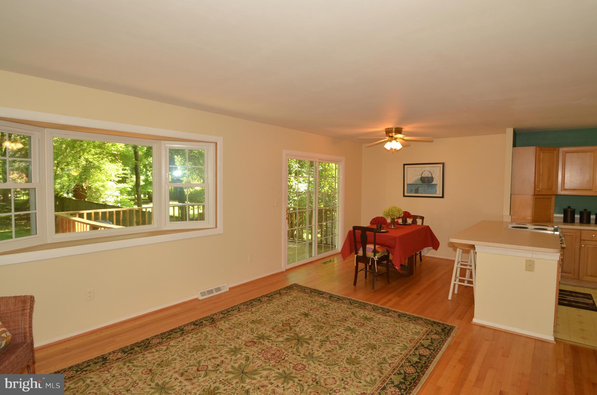 **Sought After Sunrise Beach! Water Priv! Home Offers Open Floor Plan! Wood Floors!  Bay Window, French Sliders To Deck! Kitchen Offers Large Peninsula Area! Plenty Of Cabinet N Counter Space! Low Level Rec/Fam Rm W/ Stagger Stoned Fireplace N Bench Area! 4th Bedroom/Den! Full Ba N Vanity Area! Sep. Laundry Rm. Huge Landscaped Rear Yd. *Tiered Deck, New Stone Patio.