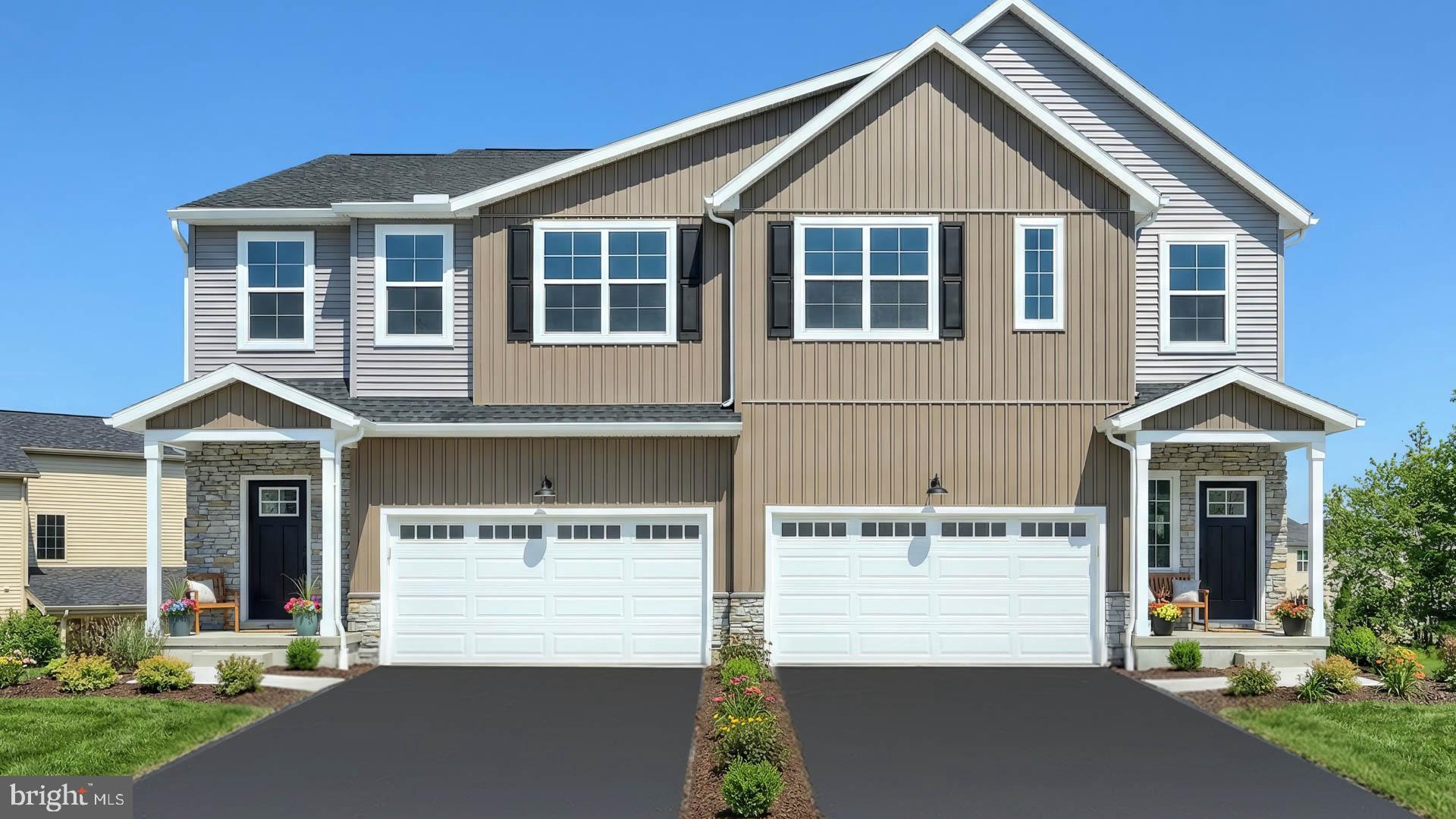 This 2-story duplex includes a 2-car garage, basement with outdoor access, and a deck for outdoor living. On the main level, the spacious family room opens to the kitchen, featuring attractive cabinetry, quartz countertops, and stainless-steel appliances. The 2nd floor owner’s suite includes a private bathroom and an expansive closet. Adjacent to the suite are 2 additional bedrooms, a full bathroom, and a convenient laundry room. Images may include virtual furnishings for illustrative purposes only.