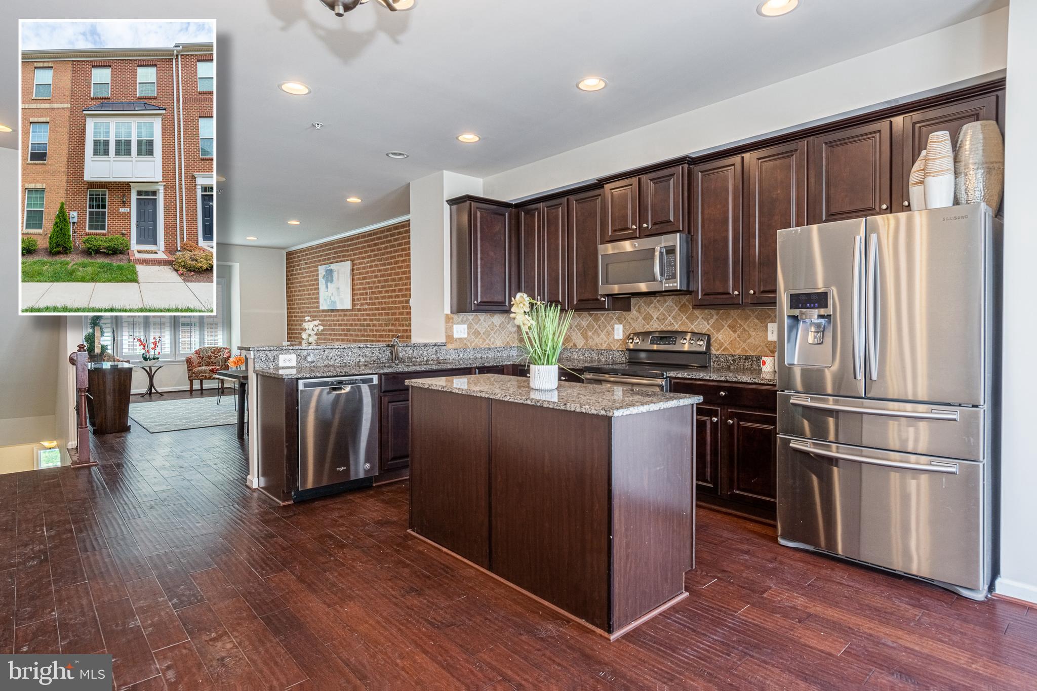 FANTASTIC OPPORTUNITY TO OWN THIS 3 BEDROOM, 3 BATH O'DONNELL SQUARE TOWNHOME WITH OVER 1,500 SQ. FT. OF LIVING SPACE, 1 CAR GARAGE, AND ADDITIONAL DRIVEWAY PARKING!  Entry level bedroom with a full bath, main level with an open floor plan featuring hardwood floors and exposed brick, a spacious living room, island eat-in kitchen with granite counters & ss appliances, 3rd level with 2 bedrooms and 2 full baths including a Primary suite with a tray ceiling, dual closets and a full bath with double sinks, main level rear deck, and 1 car garage with additional driveway parking!  Property faces community green space and conveniently located minutes to Canton, Bayview, Yard 56 shops, Canton Crossing, and major roadways!