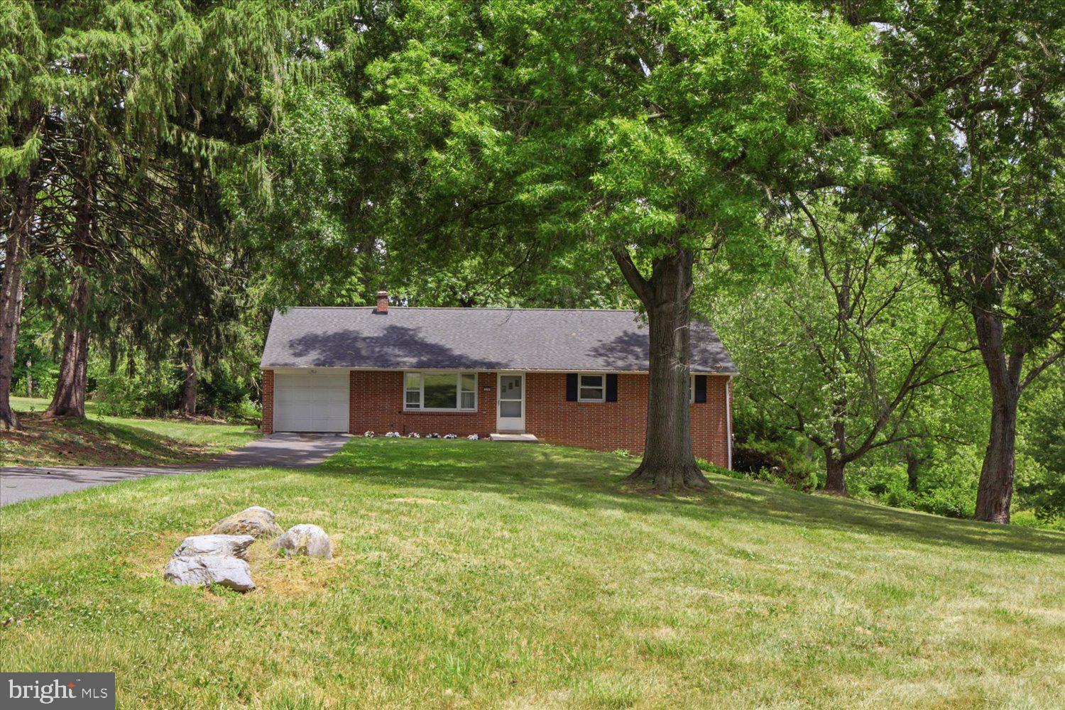 Amazing setting at the end of a Cul-de-Sac. Beautiful hardwood flooring in living room and bedrooms. Newer laminate flooring in kitchen and dining room. Solid brick home with plaster walls. Attic storage available through pull-down stairs in garage. Large basement with outside entrance could be finished into additional living space. Very private setting; watch the numerous deer in the back yard. Buyer to verify square footage.