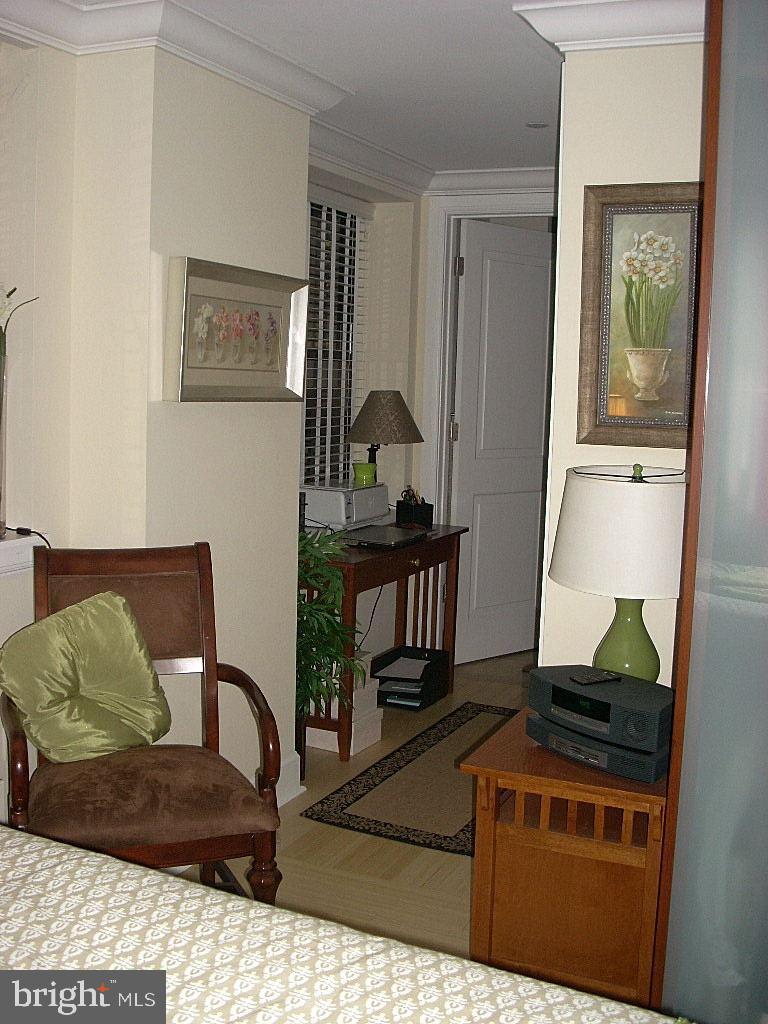 Beautifully appointed studio at The Warwick Condominiums atop The Warwick Hotel! This perfectly sized home features oversized windows, hardwood floors, and beautiful finishes throughout. Enter into the light-filled great room with ample space for living and dining and an open kitchen boasting wood cabinetry, black granite countertops, and stainless steel appliances. The marble-appointed bathroom has a wood vanity and large glass-enclosed walk-in shower. There is a laundry closet with stacked washer/dryer, additional closet space, and beautiful trim and moldings throughout. This home can be used as a full-time residence or pied-a-terre. Residents of The Warwick enjoy the same amenities as hotel guests including 24-hour door-man service, a state-of-the-art fitness room, and the use of three restaurants on the ground floor for additional fees.