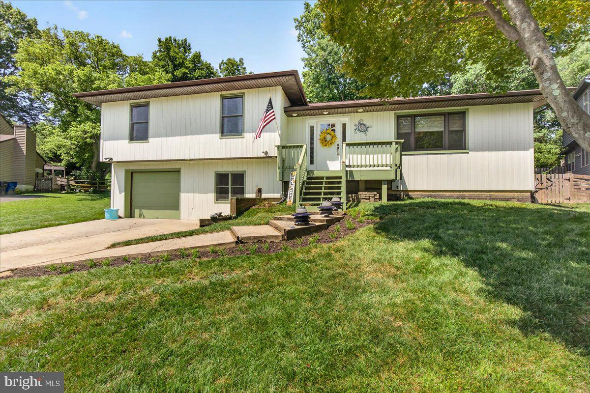 Welcome to resort-style living in the heart of Lake Linganore! Perfectly positioned just minutes from the main lake and within walking distance to the community's incredible amenities, this beautifully updated 3-bedroom, 3-bath home offers the perfect blend of comfort, privacy, and year-round enjoyment.

Situated on a rare, private lot surrounded by mature trees, this exceptional property is an entertainer's dream. Your backyard oasis features a saltwater Gunite pool (2021) a rare luxury in Lake Linganore along with a hot tub, outdoor bar, covered deck, expansive patio, and a dedicated fire pit area, creating the ideal setting for summer pool parties, relaxing evenings, and entertaining family and friends. A detached storage shed provides plenty of additional outdoor storage.

Inside, you'll be welcomed by soaring vaulted ceilings, abundant natural light, and an inviting open-concept layout. The beautifully updated kitchen features granite countertops, stainless steel appliances, ample cabinetry, and generous prep space, making it perfect for both everyday living and entertaining. The spacious primary suite boasts a beautifully renovated en-suite bath, while two additional bedrooms and updated bathrooms offer flexibility for family, guests, or a home office. During the cooler months, the efficient pellet stove adds warmth and energy savings, creating a cozy atmosphere throughout the main living area. An attached one-car garage with bonus storage completes the home.

Living in Lake Linganore means enjoying one of Frederick County's most sought-after communities. Just steps from your front door, you'll have access to four community pools, private white sand beaches, the lake, miles of scenic hiking and walking trails, tennis courts, basketball courts, beach volleyball, disc golf, tot lots, picnic areas, and a dog park.

The community comes alive year-round with Food Truck Tuesdays, the Thursday Farmers Market, concerts, fireworks over the lake, seasonal festivals, and countless neighborhood events that make Lake Linganore more than just a neighborhood it's a lifestyle.

Conveniently located just minutes from restaurants, shopping, parks, historic downtown Frederick, and major commuter routes including I-70 and I-270, with easy access to Washington, D.C., Northern Virginia, and Baltimore, this home offers the perfect combination of everyday convenience and resort-style living.

Schedule your private tour today!