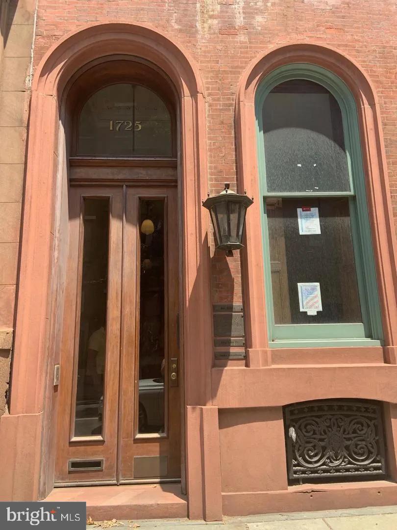 This historic property offers an exceptional investment opportunity in one of Philadelphia’s most sought-after neighborhoods, Rittenhouse Square. Situated just steps from the park, 1725 Spruce St. features a mix of commercial and residential units, providing significant income potential.

The building includes a vacant 1,100 sq. ft. commercial unit on the lower level with two half-bathrooms, a kitchenette, and outdoor access with a handicap rail and separate side-street entrance. This versatile space is ideal for various businesses and is a prime candidate for quick leasing in a high-demand area.

The upper floors house six residential units, including two studios and four one-bedroom apartments, all currently leased. Unit #5 will become available at the end of February, providing an opportunity for new tenants or upgrades. Many tenants have been in place for years, ensuring stable rental income. Units are equipped with window air conditioning and heating units, and there’s a coin-operated washer/dryer in the building for tenant use. The building also features a private mailbox area, intercom system, and a small roof deck in Unit #3.

Located in the heart of Rittenhouse Square, this property offers unparalleled access to the park, fine dining, shopping, and cultural attractions. The building’s historic charm, including a grand front door, adds character and appeal. While there are no parking spots included with the building, a nearby parking garage offers convenient rental options for residents.

The property is being sold “as-is” and presents a rare opportunity to own a large building in a prime location. With minor updates, the rent potential is significant, and units consistently rent quickly in this desirable area. The asking price offers excellent value, especially considering comparable properties in the area have sold for over $800 per square foot.

This is a unique chance to acquire a well-maintained property with long-term income potential in one of Philadelphia's most prestigious neighborhoods.
No showings will be considered without proof of buyer qualification being sent to Jacky Damis