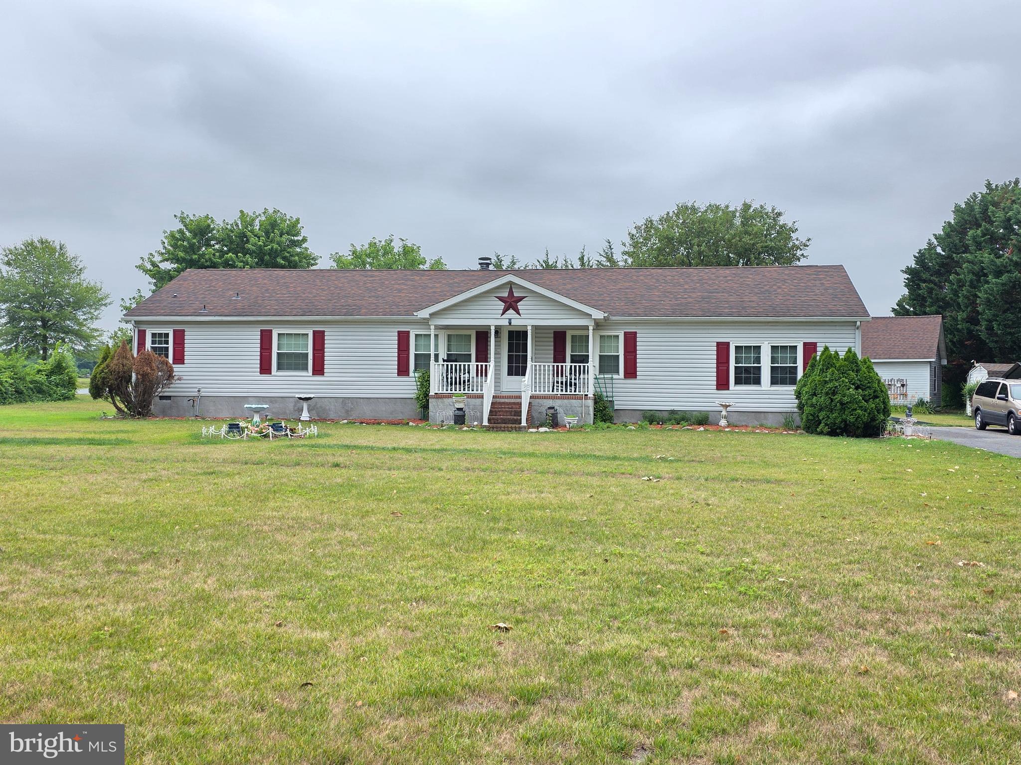 Situated on a spacious .97-acre lot, this almost 2,000 square foot well-maintained 3-bedroom, 2.5-bath home offers an abundance of living space both inside and out. The thoughtfully designed floor plan features a large living room, separate family room, formal dining room, and an eat-in kitchen with ample cabinet and counter space, creating the perfect setting for everyday living and entertaining.

The generous primary suite includes a renovated tile private bath, while two additional bedrooms and a full bath provide comfortable accommodations for family or guests. A convenient utility room and all included appliances add to the home's functionality.

Outside, the nearly one-acre property offers plenty of room to enjoy outdoor activities, gardening, or future improvements. Additional features include a 10' x 16' storage shed and a 16' x 24' detached garage complete with a floored attic, providing exceptional storage and workspace options.

This move-in-ready property combines comfortable living areas, versatile space, and a large lot, making it an excellent opportunity for those seeking room to spread out while enjoying a peaceful setting.