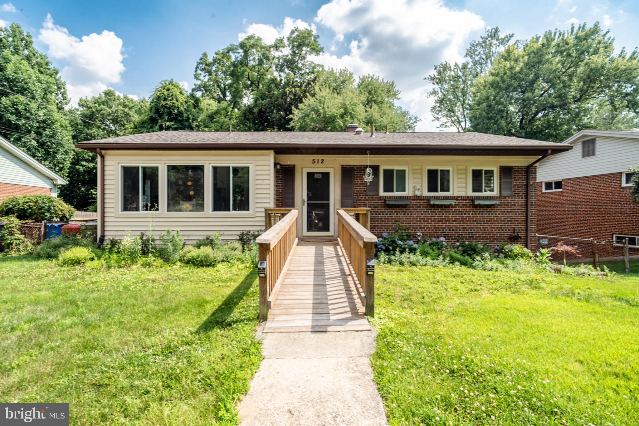 Welcome to this beautifully maintained home in the sought-after Woodmoor neighborhood. The main level offers spacious living areas, one oversized bedroom with an en-suite bath, an additional full bath, and a remodeled eat-in kitchen. The home was originally configured as a three-bedroom layout, and the current oversized bedroom could potentially be converted back if desired.

The spacious walkout basement includes a large recreation area, an additional bedroom, full bath, and ample storage space. While the basement would benefit from updates, the home has been well cared for over the years and offers solid construction and excellent potential for customization.

The backyard provides plenty of outdoor space and features a greenhouse with convenient rear access. Full of character and opportunity, this home is ideal for buyers looking to add their personal touches while enjoying a property with great bones in a desirable neighborhood. Conveniently located near shopping, dining, schools, parks, and commuter routes.