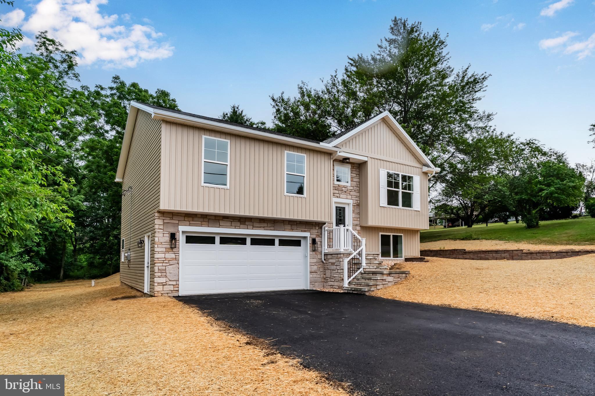 Location, Location, Location!!!  Just completed... BRAND NEW stylish home with a cook's kitchen, owner's suite, open floor plan, and a spacious deck overlooking a private back yard.  What a great setting in a mature neighborhood with wildlife in the back yard and everything you need within a 10-minute drive.   The parks and recreation building across the street has baseball fields, a playground, and constant entertainment throughout the year.  Central Dauphin high school is just around the corner.  Mountain view swim club is situated next to Lenker park both of which are 4 minutes' drive.  The first floor has 3 bedrooms, 2 full bathrooms and an open kitchen/dining/living room area.  On the lower level is a family room, possible 4th bedroom or office, powder room, laundry, storage room and access to the two-car garage.  Check out the walk through video tour and schedule your showing now! https://youtu.be/kxgzsBFY2TA?si=smbUXHi9rcsEx7jG