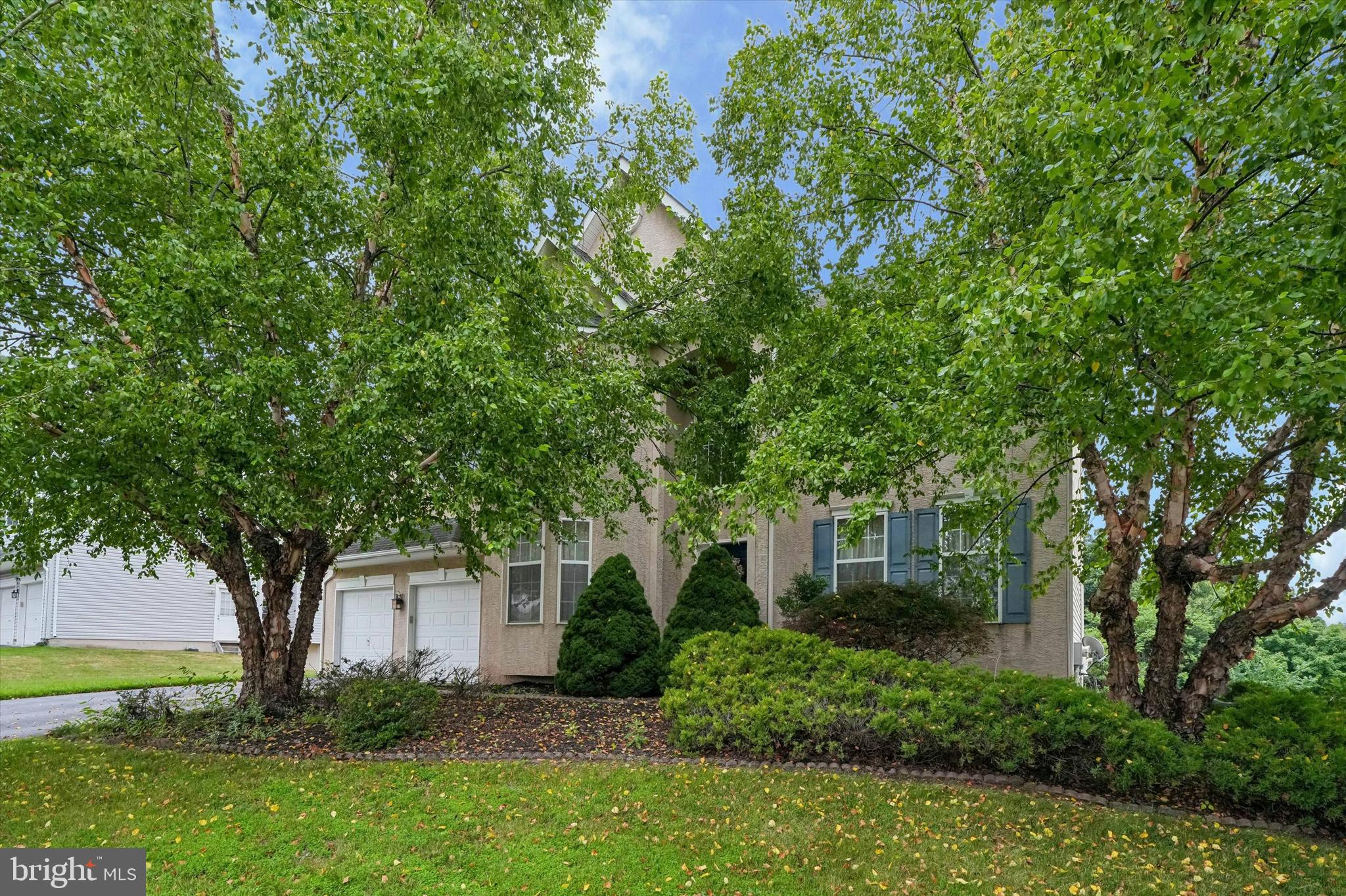 Welcome to 6003 Shady Wood Circle, nestled in the sought-after Valley High Estates community and located within the award-winning Methacton School District. Eagleville Elementary is approximately 10 minutes away, Skyview Upper Elementary and Arcola Intermediate School are just 5 minutes away, and Methacton High School is approximately 15 minutes away. 

Perched at one of the highest elevations in Montgomery County, this home offers breathtaking, long-distance views that can be enjoyed from the expansive two-story wall of windows in the family room and from the rear deck just off the kitchen's breakfast area.

Step inside to a dramatic two-story foyer featuring hardwood flooring that continues into the powder room and spacious kitchen. The inviting floor plan includes a formal dining room with chair rail molding, a first-floor office, and a striking split staircase that creates a grand first impression.

The spacious kitchen is designed for both everyday living and entertaining, featuring a center island, granite countertops, tile backsplash, abundant cabinetry, and a sunny breakfast area with access to the rear deck. The adjoining two-story family room is flooded with natural light from the impressive wall of windows and features recessed lighting, a cozy wood-burning fireplace with a classic mantel, and a ceiling fan with decorative medallion.

Upstairs, the spacious primary suite offers two walk-in closets and a private en-suite bath featuring a soaking tub, separate shower, and a private water closet. Three additional bedrooms share a well-appointed hall bath.

The finished walk-out basement provides exceptional additional living space with a bonus room ideal for a home office, gym, or hobby room, a full bath, patio access, and abundant storage.
Additional highlights include a newer gas heater and newer hot water heater.

Situated on one of the largest cul-de-sacs in Valley High Estates, the open green space creates a wonderful neighborhood gathering area and even becomes a favorite spot for winter sledding when the snow falls.

Offering a spacious floor plan, beautiful architectural details, spectacular views, and an outstanding location close to shopping, dining, parks, and major commuter routes, this home presents a wonderful opportunity to make it your own in one of Collegeville's most desirable neighborhoods.