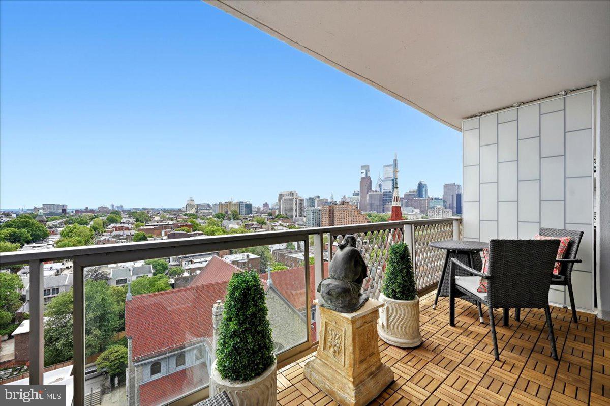 JUST RENOVATED. TURN-KEY. UNMATCHED VALUE ALONG THE PARKWAY.

Welcome to Unit 15C49 at The Philadelphian, a magazine-worthy residence that has been completely reimagined from the walls in. Following an extensive 2024 renovation, this sophisticated home offers the rare opportunity to enjoy the convenience of a full-service luxury building with the feel of a custom-designed residence.

From the moment you enter, it is clear that every detail has been thoughtfully curated. New walls, ceilings, doors, plumbing, electrical systems, and recessed lighting create a clean, contemporary backdrop, while expansive windows frame sweeping skyline views and flood the home with natural light.

The designer kitchen is both elegant and functional, featuring UltraCraft Himalayan cabinetry, quartz countertops, Corian shelving accents, under-cabinet lighting, and a premium appliance package including a Liebherr refrigerator, Frigidaire cooktop and microwave, and Summit wall oven. Whether entertaining guests or enjoying a quiet evening at home, the space delivers both style and performance.

The luxurious Porcelanosa bath rivals those found in boutique hotels, complete with designer tilework, illuminated mirror cabinetry, heated towel rack, and premium finishes throughout. Additional upgrades include motorized Shade Shop window treatments, a GE Profile washer/dryer combination, and a custom Murphy bed that maximizes both flexibility and functionality.

One of the home's most impressive features is the tiled 20-foot private balcony—an outdoor extension of the living space and the perfect setting to enjoy morning coffee, sunset views, and the sparkling Philadelphia skyline.

What truly sets this residence apart is its effortless, lock-and-leave lifestyle. Residents enjoy 24-hour concierge and doorman service, valet parking, fitness center, indoor and outdoor pools, library, community rooms, shuttle service, and on-site management. Daily conveniences—including a grocery store, pharmacy, bank, restaurant, beauty salon, and additional services—are all located within the building, creating one of Philadelphia's most convenient residential experiences.

Perfect as a full-time residence, sophisticated pied-à-terre, or stylish city retreat, Unit 15C49 offers a rare combination of luxury, convenience, and value.

Ideally positioned along the Benjamin Franklin Parkway, you're just moments from the Philadelphia Museum of Art, Kelly Drive, Fairmount Park, acclaimed restaurants, neighborhood cafés, and Philadelphia's premier cultural destinations.

For the buyer who wants a completely renovated home without the time, cost, or uncertainty of a renovation project, Unit 15C49 delivers an exceptional opportunity to move right in and enjoy the very best of city living.