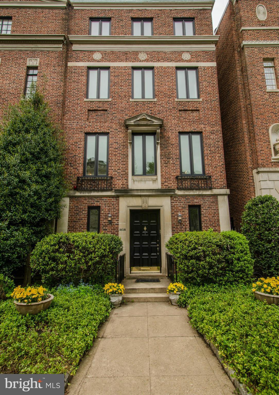 Renovated and expanded brick and stone townhouse located in one of Washington's most elegant rows.Home features formal entertaining spaces with lovely original detail, gourmet table space kitchen plus wonderful open family room and charming flagstone patio with deck. Amenities include an elevator  newer systems & windows 2 car garage.