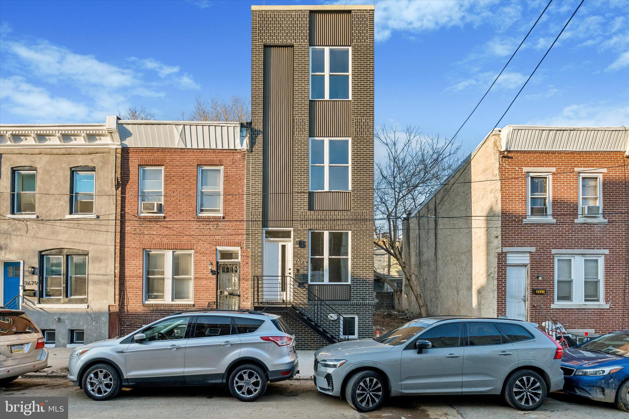 THIS STUNNING BRAND-NEW 2026 CONSTRUCTION IS LOCATED IN THE VIBRANT GRAYS FERRY NEIGHBORHOOD, RIGHT ON THE BORDER OF POINT BREEZE. ENJOY ALL THE AMENITIES YOU DESIRE AT A MORE AFFORDABLE PRICE THAN MANY OTHER AREAS IN PHILADELPHIA.
THIS METICULOUSLY CRAFTED 3-STORY HOME OFFERS OVER 2,000 SQFT OF LUXURIOUS LIVING SPACE AND FEATURES 4 SPACIOUS BEDROOMS, 3 CUSTOM DESIGNER BATHROOMS, A FULL BASEMENT, AND A PRIVATE ROOFTOP DECK WITH STUNNING 360-DEGREE CITY VIEWS.
STEP INSIDE TO A CONTEMPORARY OPEN FLOOR PLAN FILLED WITH NATURAL LIGHT, FEATURING BEAUTIFUL HARDWOOD FLOORING, CLEAN MODERN LINES, AND HIGH-END FINISHES THROUGHOUT. THE CHEF’S KITCHEN IS EQUIPPED WITH PREMIUM SAMSUNG STAINLESS STEEL APPLIANCES, QUARTZ COUNTERTOPS, CUSTOM SHAKER-STYLE CABINETRY, AND A LARGE ISLAND PERFECT FOR ENTERTAINING.
THE BATHROOMS ARE THOUGHTFULLY DESIGNED WITH IMPORTED PORCELAIN AND MARBLE TILE, FRAMELESS GLASS SHOWER ENCLOSURES, AND SLEEK BLACK MATTE FIXTURES, CREATING A TRUE SPA-LIKE EXPERIENCE. THE PRIMARY SUITE OFFERS A PEACEFUL RETREAT WITH GENEROUS SPACE AND MODERN FINISHES.
ENJOY BREATHTAKING SKYLINE VIEWS FROM YOUR PRIVATE ROOFTOP DECK—PERFECT FOR ENTERTAINING OR RELAXING. ADDITIONAL FEATURES INCLUDE A BLUETOOTH SURROUND SOUND SYSTEM AND CONVENIENT USB OUTLETS THROUGHOUT.
THE HOME ALSO INCLUDES A PRIVATE BACKYARD SPACE IDEAL FOR OUTDOOR GATHERINGS, AS WELL AS A FULL BASEMENT WITH LAUNDRY AND ADDITIONAL STORAGE.
BENEFIT FROM A FULL 10-YEAR APPROVED TAX ABATEMENT, MAKING THIS HOME AN EXCEPTIONAL OPPORTUNITY FOR BOTH HOMEOWNERS AND INVESTORS.
LOCATED IN A RAPIDLY DEVELOPING AREA SURROUNDED BY NEW CONSTRUCTION, RESTAURANTS, AND EASY ACCESS TO CENTER CITY—THIS IS A PROPERTY YOU DON’T WANT TO MISS.
SCHEDULE YOUR PRIVATE SHOWING TODAY