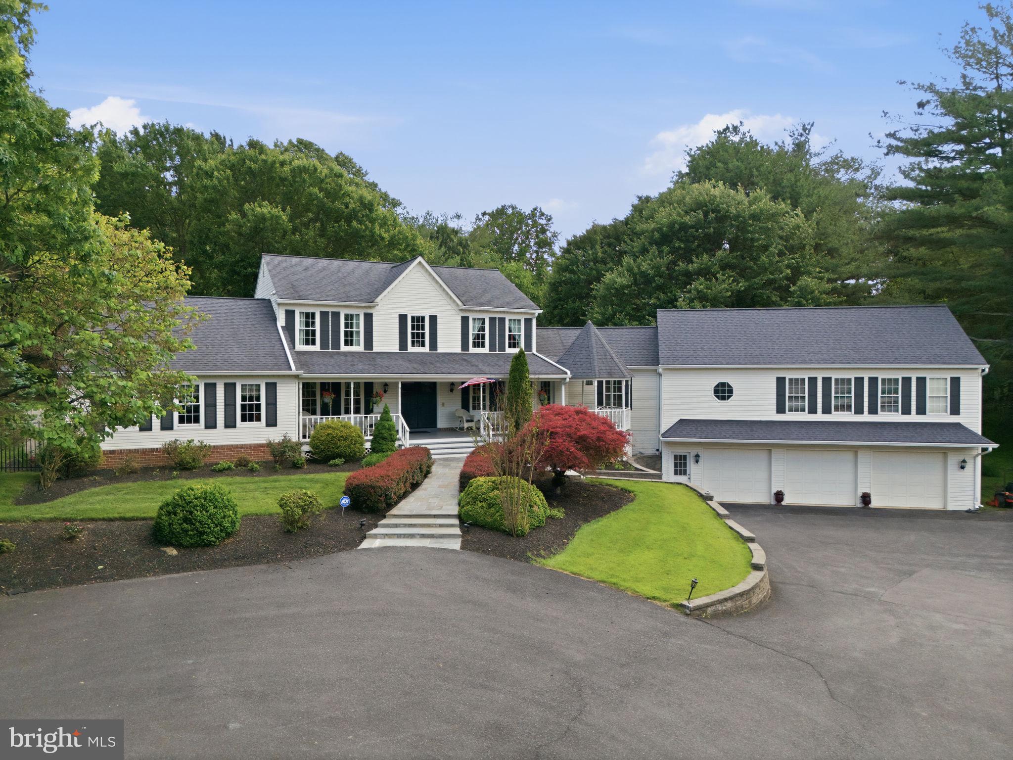 A rare and exceptional find, this property offers an unparalleled sense of privacy and serenity right in the heart of Darnestown. The remodeled residence features an expansive main-level primary suite, complete with a tray ceiling, spa-inspired bath and a generously sized walk-in closet.  At the center of the home is a gourmet kitchen designed for effortless entertaining.  It features pull out drawers, a wine refrigerator, 2 dishwashers, a built in Miele coffee maker and granite countertops.   The adjacent great room offers remarkable versatility, showcasing a gas fireplace, skylites and a custom wall of built-in bookshelves perfect for a library retreat, game center or recreational space.  Notice the plentiful other touches throughout including the crown molding, wood floors,  wide doorways, high end kit. appliances, main level laundry rm, fenced yard, 2 zone heating, 2 tiered deck in the back, lush landscaping and 3 car garage    all creating a luxurious experience.   You've got to see it! 

OPEN HOUSE  Sunday  6/7   Noon - 2:00.

Outside, the property transitions into a tranquil backyard oasis, offering an idyllic, completely secluded backdrop for quiet morning coffee, relaxation, or large-scale outdoor gatherings.  Completing this picture, the expansive front porch serves as a picturesque spot to eat, read, or just to overlook the manicured grounds.
The 3 car garage offers plenty of space for parking and is easy to access. It has a convenient rear garage door also.  The driveway is stately/sweeping and is wide to provide additional parking options.
ADJACENT OUTLOT #4 (on the lower side) is included as part of this sale.  It is .48 acre  for a total of 2.24 acres.