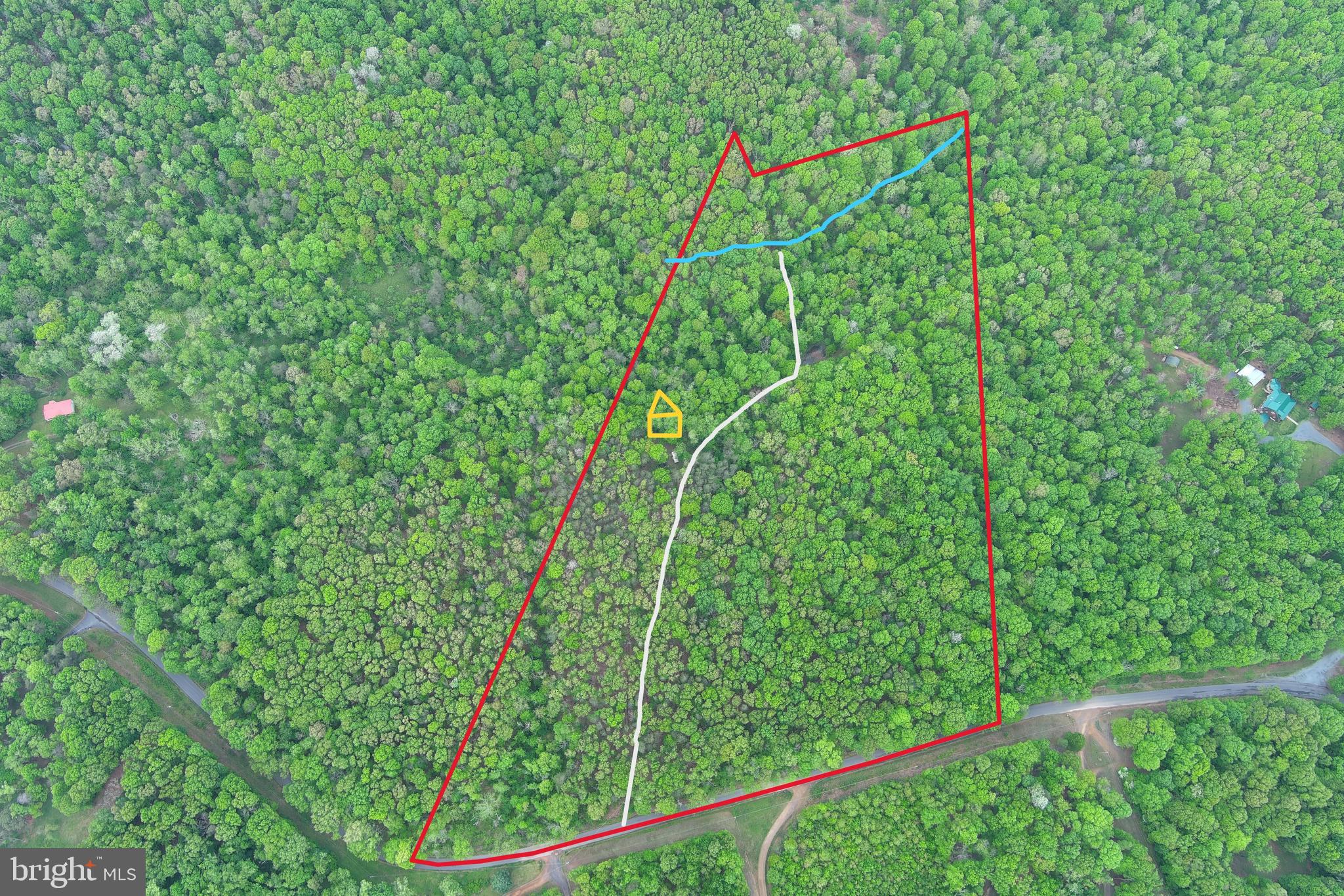 EASY FOREST....20.6 WOODED ACRES OF 100% USABLE GENTLE HARDWOOD FOREST. 20K+ WORTH OF INFRASTRUCTURE ALREADY IN PLACE, 800+ FT DRIVEWAY ROUGHED IN TO BUILDING SITE AND UNDERGROUND ELECTRIC INSTALLED TO BUILD/CAMP SITE, WITH A LITTLE WORK IT WILL BE READY FOR YOUR CAMPER. NICE SEASONAL STREAM RUNS THROUGH THE PROPERTY AND THERE'S A POTENTIAL POND SITE BY SPRING. EASY ACCESS, TONS OF FRONTAGE ON QUIET PAVED COUNTRY ROAD.....PRIVATE, YET CONVENIENT. NO HOA AND VERY MINIMAL RESTRICTIONS, MOBILE HOMES OK. HUNT, CAMP, SHOOT, ATV'S......BUILD A MANSION OR A CABIN. OLD CAMPER STAYS, NEWER CAMPER WILL BE REMOVED PRIOR TO SETTLEMENT. A LITTLE JUNK CLEAN UP REQUIRED, A DAYS WORK TOPS. WITH A LITTLE ELBOW GREASE THIS PROPERTY COULD BE A REAL GEM......IT CHECKS ALL THE BOXES. ONLY 40 MINUTES FROM WINCHESTER, VA AND WITHIN 2-2.5 HOURS OF DC/BALT METRO. WHAT ARE YOU WAITING FOR? STEP #1 TO LIVING THE DREAM.....BUY THE LAND!