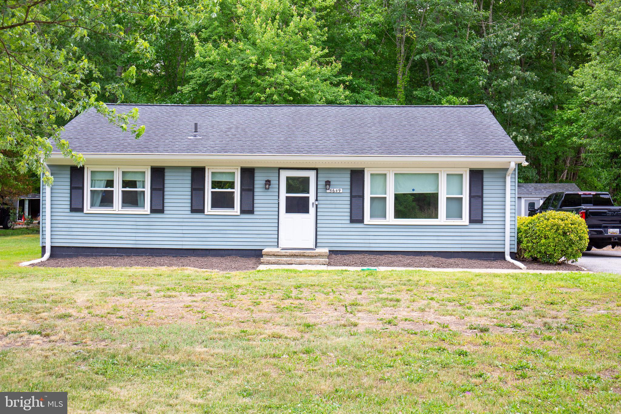 Own this home with no down payment required. This property qualifies for USDA and FHA solar+ financing, making homeownership attainable. This well-maintained home is located in an area eligible for a 100% USDA Zero-Downpayment Loan, providing a chance to buy a move-in ready home without the financial burden of a down payment. The home features a bright, open layout on a single level, designed for easy living. Positioned in the center of Churchton, this 3-bedroom coastal rambler includes a combined kitchen and dining area, spacious bedrooms, central air conditioning, public sewer, and a sizable third of an acre backyard well suited for summer gatherings. The property has been well cared for, allowing for immediate occupancy without significant renovations. Enjoy a tranquil, water-oriented lifestyle, just 1 to 2 miles from two popular waterfront locations: Franklin Point State Park, which offers over 470 acres of protected marsh, hiking trails, and wildlife viewing along the West River and Chesapeake Bay, and Jack Creek Park, which features walking trails, a secluded beach, and a launch site for kayaking, canoeing, and paddleboarding. Spend weekends enjoying boating, crabbing, or fishing, with convenient public boat launches, local marinas, and waterfront dining nearby. Experience the tranquility of a close-knit coastal community while still having an easy commute to Joint Base Andrews, the Annapolis waterfront, and the Washington Beltway, all without the hassle of an HOA.