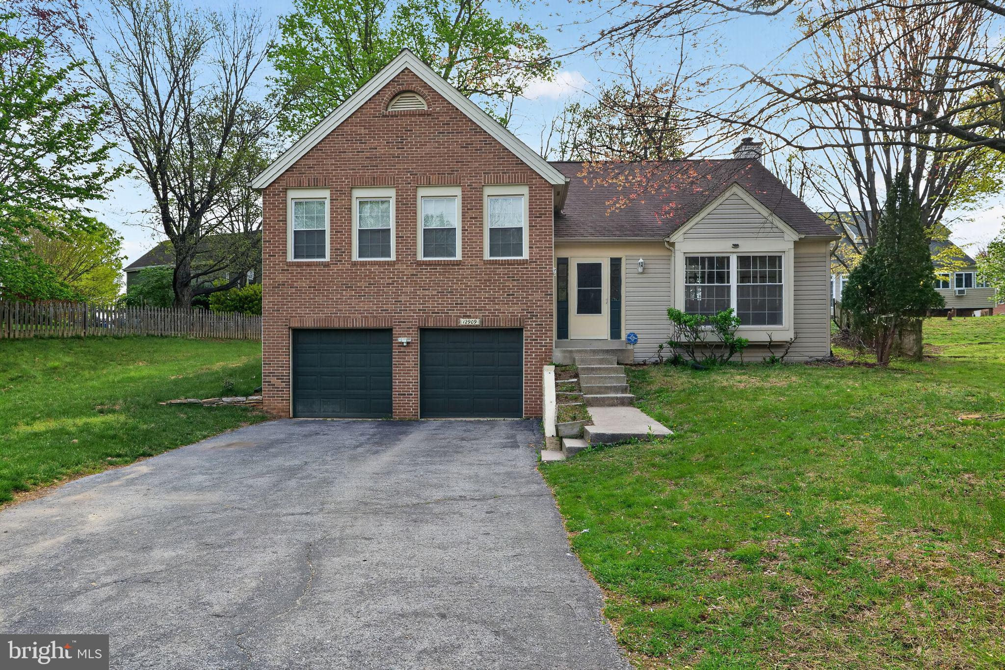 Welcome to this charming split-level home nestled on a quiet cul-de-sac in Silver Spring’s desired Deer Park community. The open floor plan boasts high vaulted ceilings with an overlook, creating a spacious and airy ambiance throughout. Recent updates, including fresh paint,flooring, new refrigerator,kitchen countertops,new patio, garbage disposal and more   enhance the home's appeal, along with a new hybrid water heater and HVAC installed in 2022. The entry-level living room features a high vaulted ceiling and overlook from above, adding architectural interest. Ascend the stairs to the dining area and the bright and airy kitchen offering abundant natural light from the skylights and high vaulted ceiling, where you’ll love preparing your favorite meals with a new sliding door to the backyard, making it ideal for outdoor entertaining. Continue to the primary bedroom, also under a vaulted ceiling, that includes a vanity dressing area and an attached full bath. Two additional bedrooms and a hall bath complete the main level. The lower level offers a cozy family room with a wood-burning fireplace, a fourth bedroom, another full bath, providing ample living space, and a large storage room. Outside, the landscaped yard features a ground deck and mature shade trees, creating a tranquil outdoor retreat.