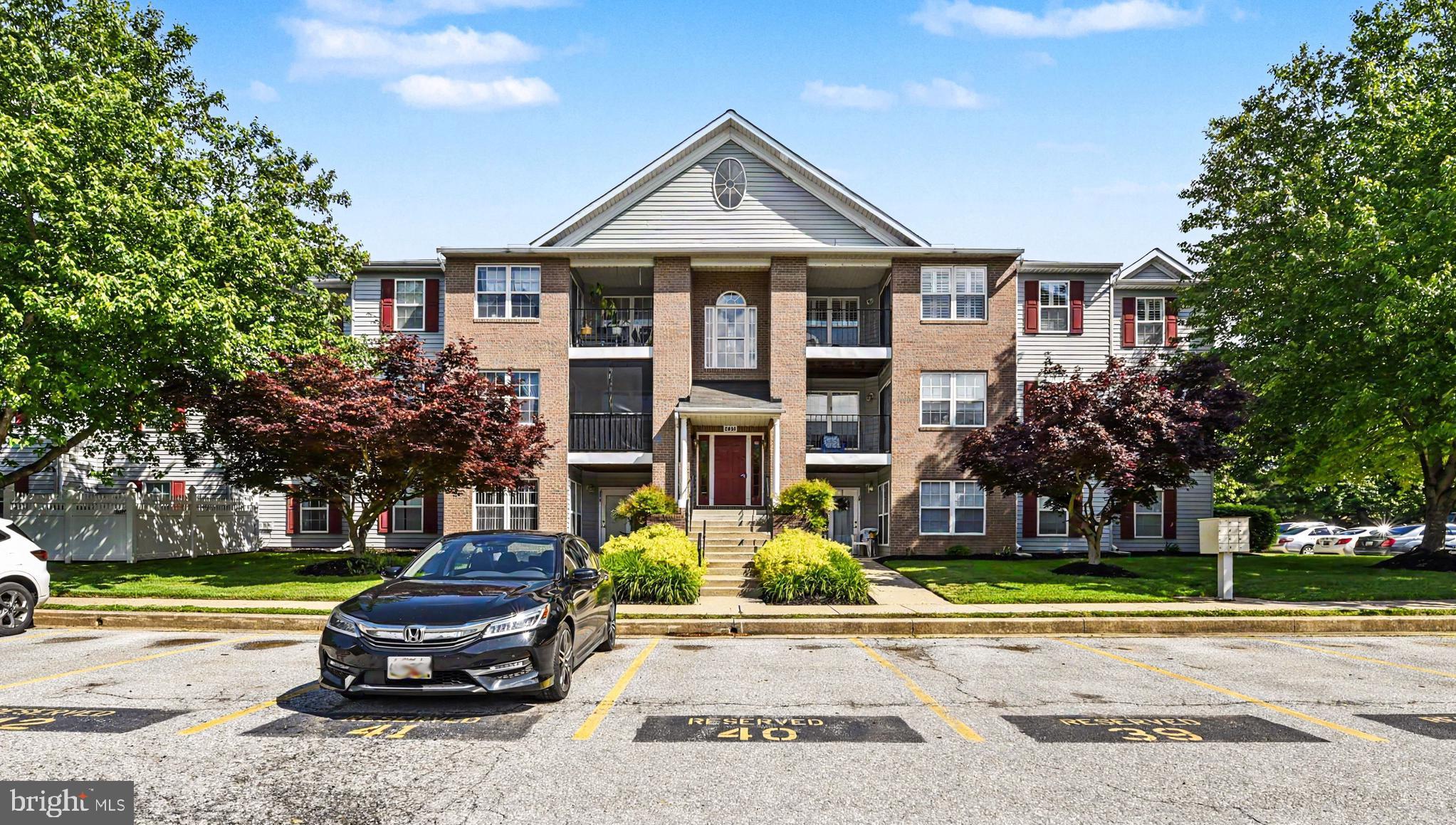 Rarely available, move-in-ready renovated condo in Brandywine Station. This main-floor unit features two bedrooms & one full bath, which includes a safe-step walk-in tub/shower combo & a primary bath rough-in complete w/ installed fan. The home boasts hardwood flooring throughout, w/ luxury vinyl tile floors in the bathroom & laundry rooms. The primary bedroom offers a walk-in closet plus a second, larger closet with the rough-in for the full bath. The kitchen is updated w/ granite countertops, stainless steel appliances & luxury vinyl plank floors. Key features & recent upgrades include: Accessibility: Along with the safe tub, wide doors & hallway, separate rear entrance w/ a walkway leading directly to the parking lot & a designated handicapped space.  Systems: Newer hot water heater (2024) & heat pump (2018) w/ a transferable maintenance contract. -Security: Located within a building w/ a locked entrance. Pet friendly, you will love the walk-out back patio overlooking a nice private yard & side parking lot. Reserved parking spot in front of building #41.