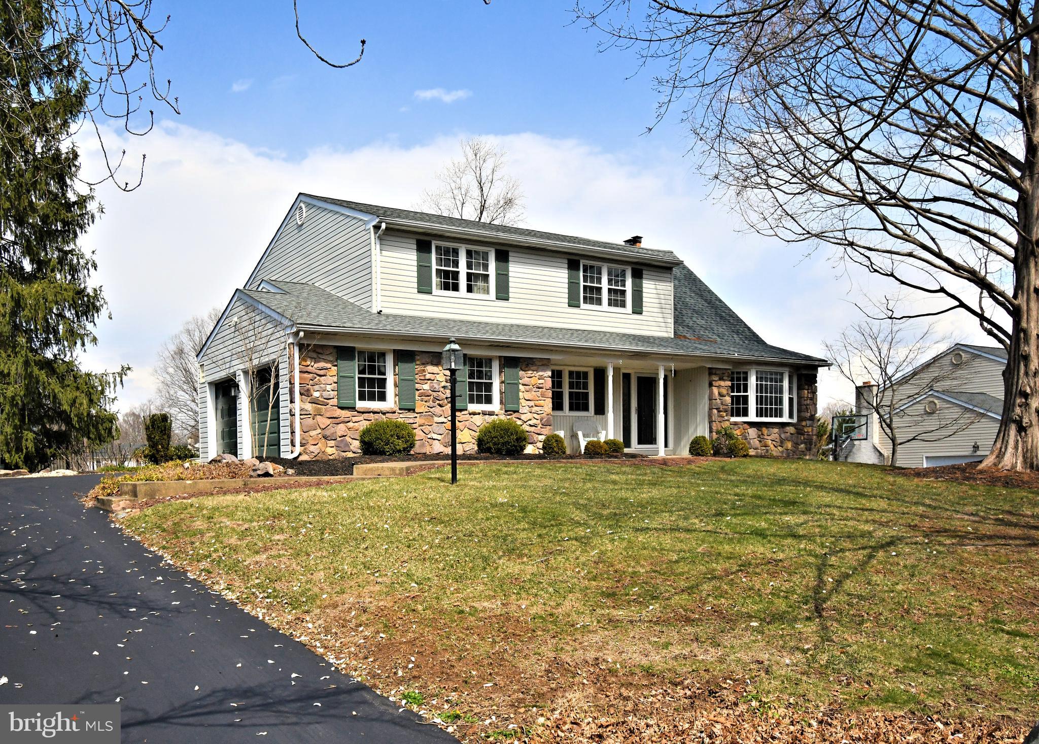 Elegant 5-Bedroom Center Hall Colonial with Saltwater Pool & Three-Season Porch!  This stunning 2,900 sq. ft. center hall colonial offers the perfect blend of classic charm and modern upgrades. Featuring 5 bedrooms, 2.5 bathrooms, and a 22,000-gallon saltwater in-ground pool. Inside, the hardwood flooring flows through the kitchen, dining room, and foyer, creating a warm and inviting atmosphere. The spacious kitchen boasts a large center island, 42-inch cabinets, and granite countertops and premium appliance package KithcenAid ovens Bosch dishwasher.  The living room features gorgeous ceiling beams, a gas fireplace, and built-in shelving  Enjoy year-round comfort in the three-season porch, complete with a built-in wine refrigerator and endless cabinets for extra storage.  Upstairs, five generously sized bedrooms provide ample space, including a primary suite with an en-suite bath. The home also features a partially finished basement with custom built-ins, offering extra living space for a home office, gym, or entertainment area.  Irrigation system installed, whole house generator, central vacuum and more! With a new roof and air conditioning system installed in 2023, this home is move-in ready with modern conveniences.