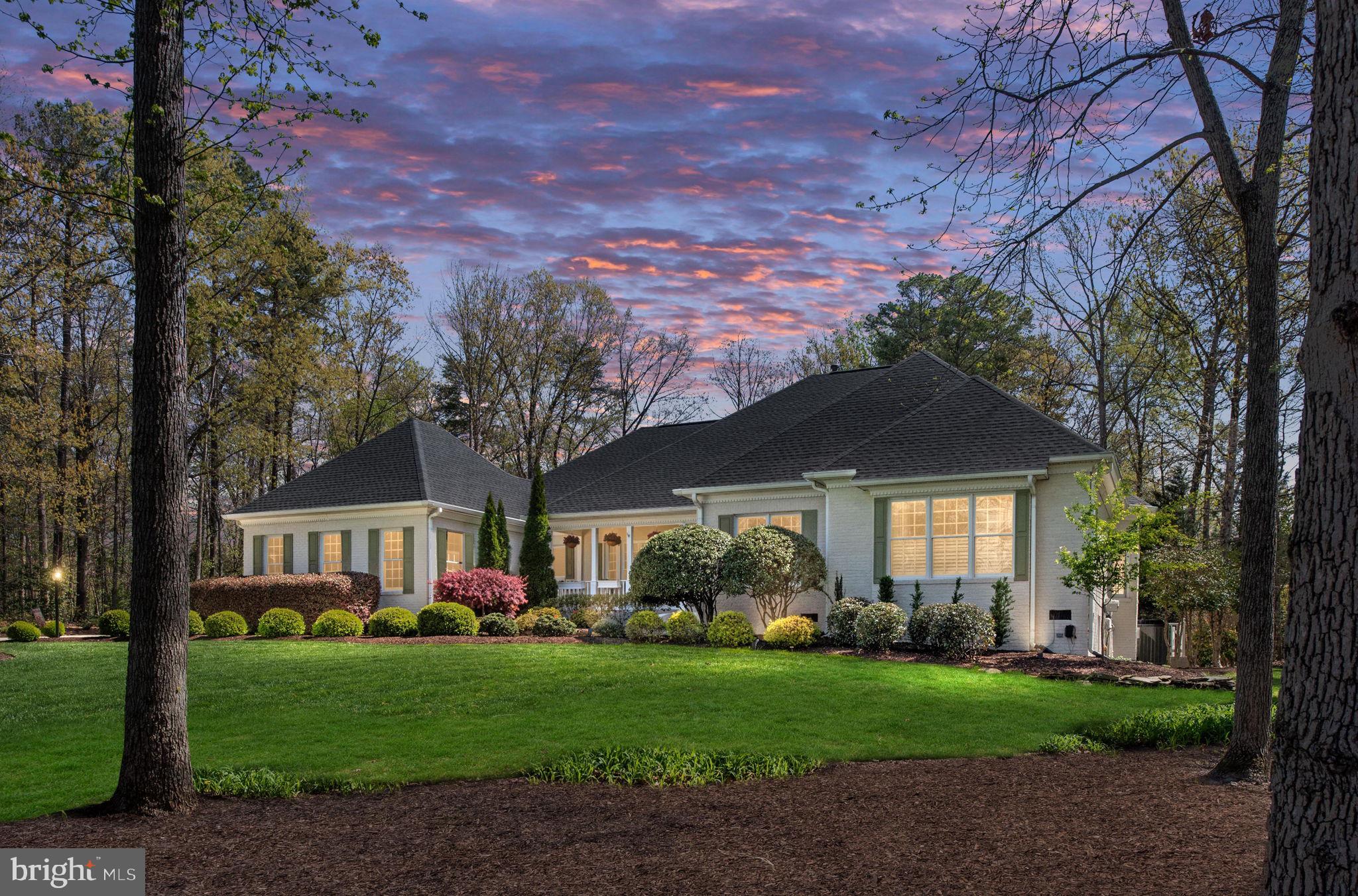 This is the one you’ve been waiting for! Nestled on just over an acre of lush lawn in the picturesque community of Fawn Lake, this exceptional property is more than just a house; it is a sanctuary that offers a perfect retreat from the demands of daily life. Imagine waking up each morning to the gentle sound of nature, with the sun casting its golden rays on the tranquil waters of the lake just across the street. This is truly the perfect location for those seeking serenity and beauty.

As you approach the home, you are greeted by a stunning façade that exudes elegance and charm. The inviting front porch beckons you to sit and take in the gorgeous lake views, while the backyard features your very own private inground saltwater pool—an oasis of relaxation and fun. Picture yourself swimming with family and friends, surrounded by mature trees and meticulously landscaped gardens. It’s not just a home; it’s a personal sanctuary where memories are made, laughter is shared, and life is celebrated.

Stepping inside, you are immediately enveloped by the elegance of the interiors. The soaring ceilings and open spaces create an airy ambiance, while the huge windows invite natural light and showcase the breathtaking views from every angle. The hardwood floors that grace the main living areas add warmth and sophistication, setting the stage for gatherings and quiet evenings alike.

The formal dining room is a masterpiece in itself, offering an exquisite setting for dinner parties and festive celebrations. It flows seamlessly into the expansive family room, where a cozy gas fireplace serves as the focal point. This space is perfect for unwinding after a long day or gathering with loved ones for movie nights and heartfelt conversations.

As you enter the kitchen, you’ll be captivated by its design—truly a chef’s delight. The huge island is perfect for entertaining guests, while the granite countertops and stunning Seaglass tile backsplash add a touch of luxury. This culinary haven opens into a charming breakfast area, ideal for enjoying your morning coffee while soaking in the views of your private paradise. Adjacent to the kitchen is a cozy room complete with another fireplace, providing a warm and inviting atmosphere for casual family gatherings.

For those who love to entertain, the incredible Butler’s pantry is a game-changer, making hosting parties and gatherings a breeze. With ample space for preparation and storage, it ensures that every event is seamless and enjoyable.

The main level features a luxurious primary bedroom that overlooks the tranquil pool, offering a peaceful retreat at the end of the day. The spa-like primary bath is nothing short of a dream, boasting a tile walk-in shower and a separate soaking tub for relaxation. Imagine indulging in a long, soothing bath after a day spent in the sun. Two additional bedrooms on this level share a beautifully designed Jack and Jill bath with a double vanity for convenience, ensuring that everyone has their own personal space.

A separate office on the main level provides a quiet escape for those who work from home or need a dedicated space for study and creativity. The possibilities are endless, and the layout of this home is perfect for modern living.

But that’s not all. The unfinished basement presents a canvas for your imagination—whether you envision a home theater, a game room, or even additional bedrooms, the space is ready for your personal touch.

Living in the beautiful gated community of Fawn Lake offers an unparalleled luxury lifestyle. Here, you’ll find exceptional amenities that cater to every desire. Spend your days enjoying the recreational boating lake, sandy beach, and community pool, or host gatherings at the clubhouse. Golf enthusiasts will revel in the nearby Arnold Palmer golf course, while tennis and pickleball courts await those who love to stay active. For families, soccer and baseball fields, miles of scenic walking trails, and
