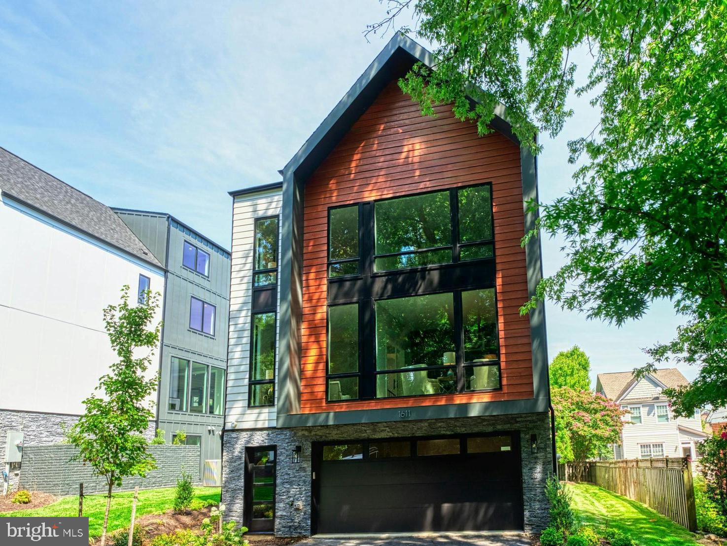 Welcome to 𝟏𝟔𝟎𝟗 𝐇𝐮𝐧𝐭𝐢𝐧𝐠 𝐀𝐯𝐞, a modern masterpiece in the heart of McLean, offering a lifestyle of unparalleled elegance and convenience. Boasting access to top-rated schools, close to everything, this new construction property is a beacon of luxury living. Featuring 6 beds and 6 baths spread across 𝟒,𝟒𝟔𝟕 𝐬𝐪𝐟𝐭 𝐚𝐛𝐨𝐯𝐞 𝐠𝐫𝐚𝐝𝐞, with an additional 𝟏,𝟑𝟐𝟓 𝐬𝐪𝐟𝐭 of finished space below grade, this home exudes spaciousness and thoughtful design. The 2-car front-load garage adds to the convenience. Upon entering, natural light floods the inviting foyer and living spaces, setting the tone for the refined atmosphere within. The formal dining room epitomizes sophistication, providing the perfect backdrop for memorable gatherings. The heart of the home is the well-designed open kitchen, equipped with commercial-grade top-of-the-line appliances, stacked cabinetry, in/under cabinet lighting, and a spacious waterfall island with bar seating. The adjacent family room is a true spectacle, featuring a fireplace, built-ins, ceiling features, and a wall of glass overlooking backyard. An expansive, maintenance-free deck and fence are included. The upper floor is thoughtfully laid out, with the primary owner's suite boasting large his and her walk-in closets, a deep soaking tub, double vanities, and a shower. Two secondary bedrooms with bath access and walk-in closets complete the upper level, each room bathed in natural light. The lower level adds over 1,000 sqft of luxury living space, fully finished with the same quality as the main floor. An extra-wide areaway walk-out leads to the backyard, while the open floor plan includes a recreation room, designer wet bar, and a study. For added allure, the bonus loft level offers a suite, wet bar, and a maintenance-free rooftop terrace, creating an architectural masterpiece. The property also features a Contemporary-style garage, premium Pella-450 wood windows, and more, ensuring a lifestyle of luxury and comfort. Don't miss the opportunity to make this exceptional property your new home! 𝐋𝐚𝐬𝐭 𝐞𝐯𝐞𝐫 𝐨𝐩𝐩𝐨𝐫𝐭𝐮𝐧𝐢𝐭𝐲 𝐭𝐨 𝐩𝐮𝐫𝐜𝐡𝐚𝐬𝐞 𝐚 𝐡𝐢𝐠𝐡 𝐞𝐧𝐝 𝐦𝐨𝐫𝐝𝐞𝐧 𝐦𝐨𝐝𝐞𝐥 𝐡𝐨𝐦𝐞 𝐢𝐧 𝐌𝐜𝐋𝐞𝐚𝐧 𝐛𝐞𝐥𝐨𝐰 $𝟐.𝟏𝐌 𝐞𝐯𝐞𝐫!