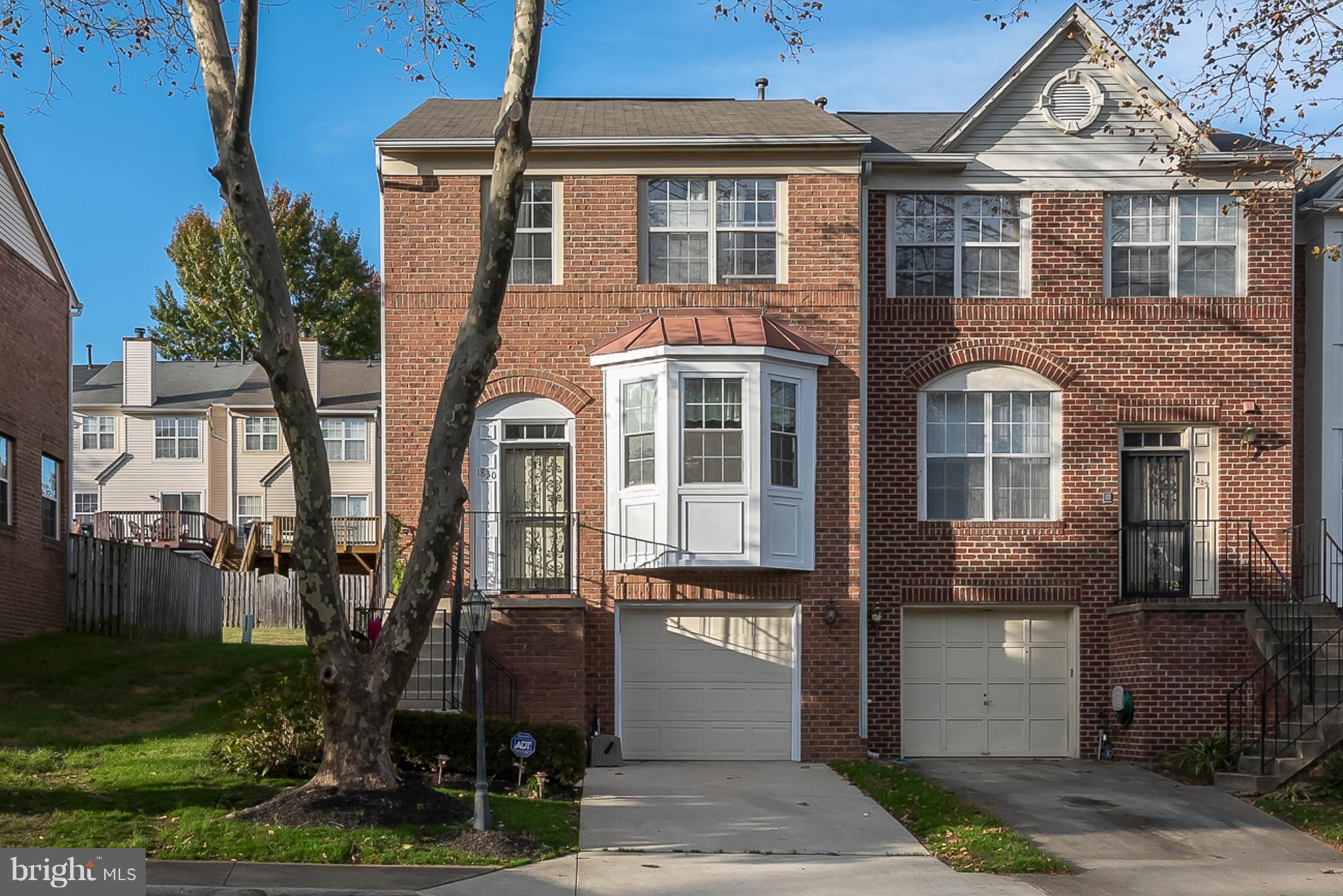 Brick front and sided, 3-level, end-unit town house in Woodview Village.  Check out all the features : 2 spacious bedrooms, 2.5 baths w/rough in for half-bath off lower-level recreation room;  main level proudly offers spacious living room w/extra windows for great natural light and wood-burning fireplace, open dining room;  remodeled master bathroom w/soaking tub, double sinks, separate shower; master bedroom offers new carpet and walk-in closet; kitchen boasts granite countertops, Travertine flooring and stainless steel appliances, including built-in microwave, gas stove, dishwasher, disposal, with generous space for table & chairs, plus pantry and bay window;  half bath conveniently located near front door; gleaming hardwood floors on main level; new carpet on upper level and stairs; expansive, fenced backyard; 1-car attached garage w/opener;  perfect for entertaining; located a short-drive or walkable distance to major shopping area, restaurants, and places of worship; conveniently located to Rts. 202, 495, 214 and metro station; you won't be disappointed.  Also for rent $2000/mo; MDPG375752
