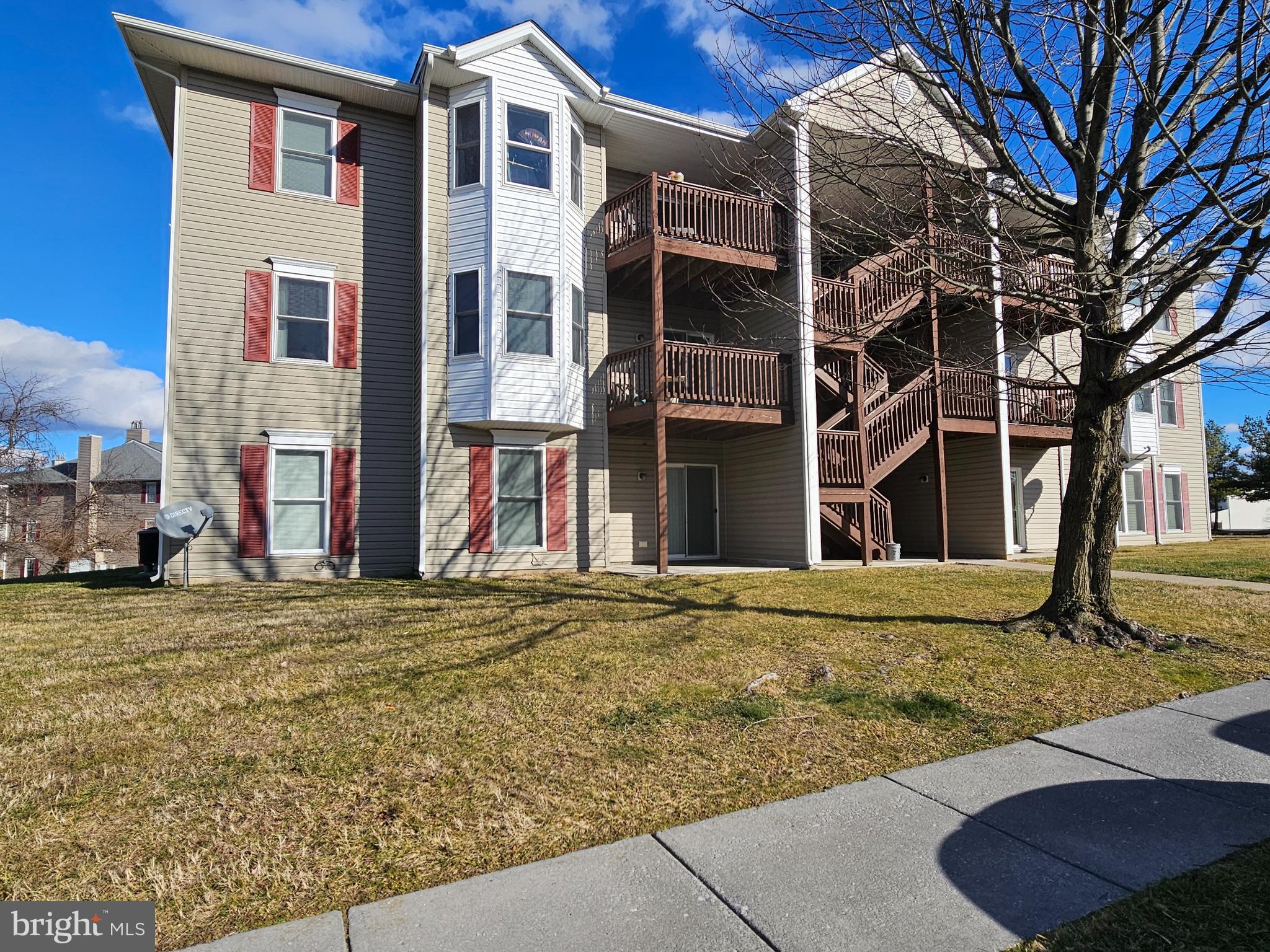 Great 1st floor condo unit featuring one-level living!  The home has all brand-new carpeting throughout, a nice galley kitchen with plenty of cabinets and all appliances, 2 good-sized bedrooms with natural lighting, the master bedroom has a walk-in closet and its own bath with lovely tile accents around the shower, plus there's another full bathroom off the hall.  The living room is generous size with a sliding glass door that leads out to your very own patio area.  Imagine sitting on your patio enjoying the outdoors!  This unit also comes with the additional closet storage shed to store all your extra items or holiday decorations.  There's plenty of storage inside the home, too - an entry closet, shelving above the washer/dryer, and in the linen closet in the master bath.  The condo fee includes your monthly water/sewer and trash, plus you get one, assigned parking space right out front.   The Association provides road maintenance and shovels the walkways of snow for you.  Great for 1st time buyers or those wishing to downsize!