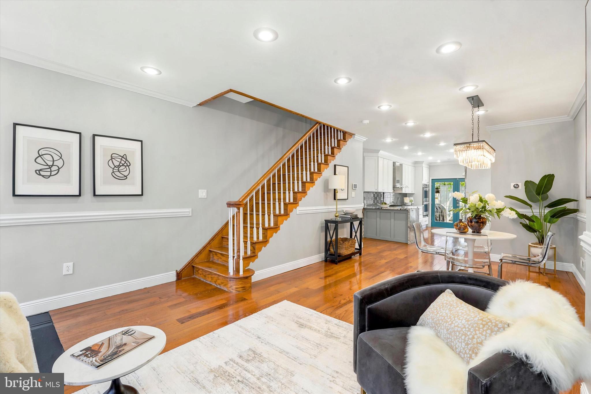 Welcome to 1633 Ellsworth Street, a beautiful 5-bedroom, 3.5-bath home in the heart of Newbold. Offering multiple levels of thoughtfully designed living space, this residence blends modern finishes, functional design, and exceptional outdoor living.
The main level features an open-concept layout with hardwood floors, spacious living and dining areas, and a powder room. At the heart of the home is a chef’s kitchen featuring premium GE Monogram stainless steel appliances, custom cabinetry, and a dramatic granite waterfall island designed for both everyday living and entertaining. Just beyond the kitchen, a private rear patio provides the perfect setting for outdoor dining and relaxation.
The second floor offers three bedrooms and a full bath, including one room currently configured as a custom walk-in dressing room. The third floor features two additional bedrooms, including a spacious primary suite complete with a spa-inspired bath, soaking tub, and glass-enclosed shower.
The finished lower level adds valuable flex space with a full bath, ideal for a guest suite, home gym, media room, or office. Above it all, the rooftop deck delivers sweeping views of the Philadelphia skyline and an ideal space for entertaining.
Located just minutes from Rittenhouse Square, Penn, CHOP, Center City, and some of Philadelphia’s best restaurants and coffee shops, 1633 Ellsworth Street offers the perfect combination of space, style, and location.